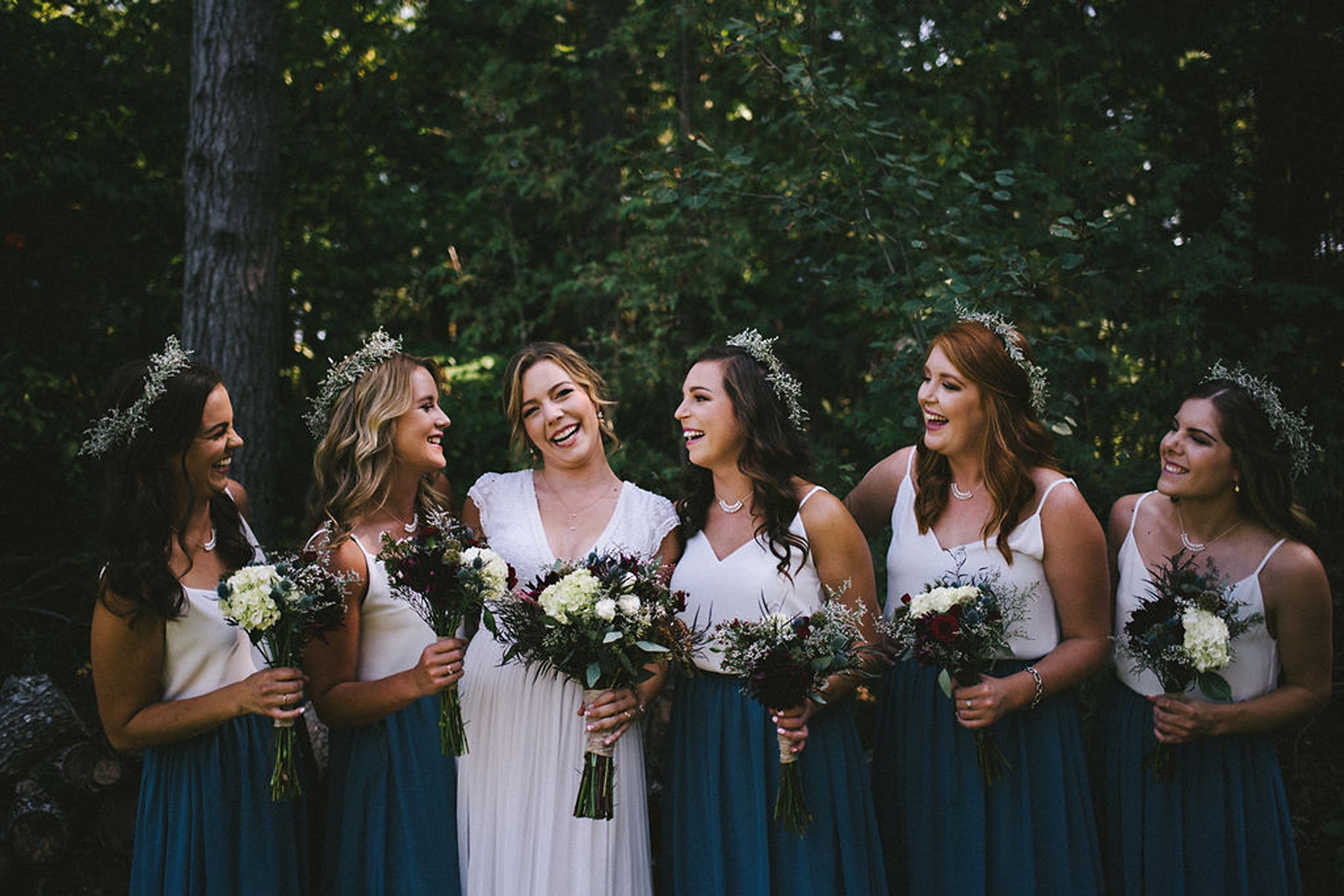 Bridal party wearing two tone separates at camp wedding in Parry