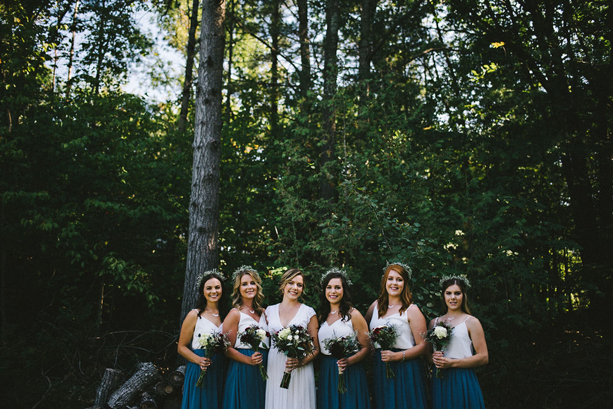 Bridal party wearing two tone separates at camp wedding in Parry