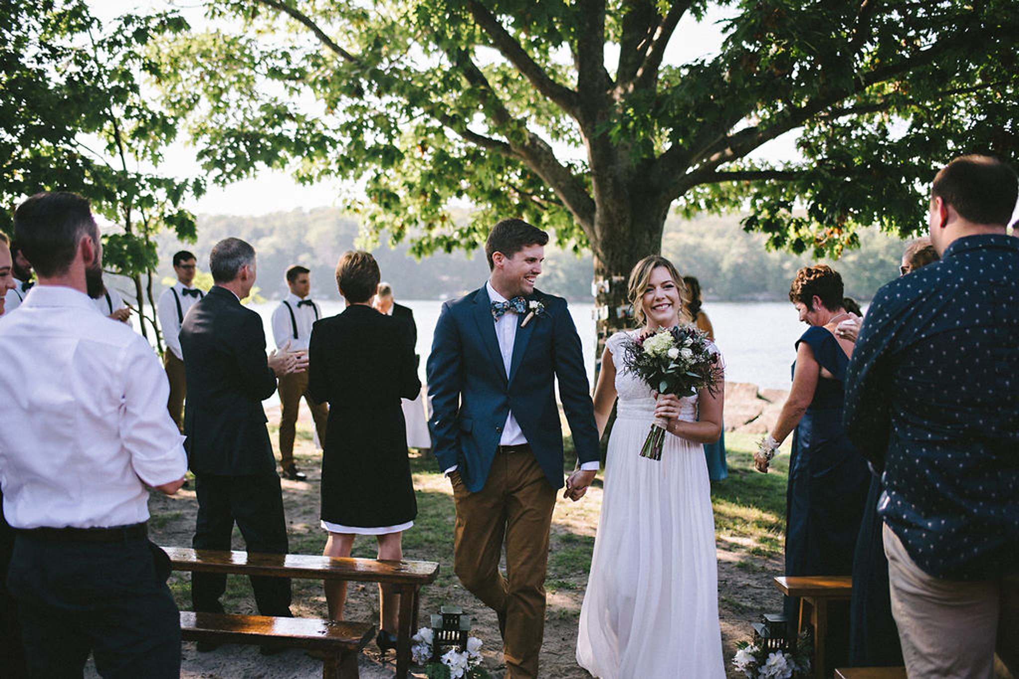 Ceremony exit during lakeside Parry Sound camp wedding