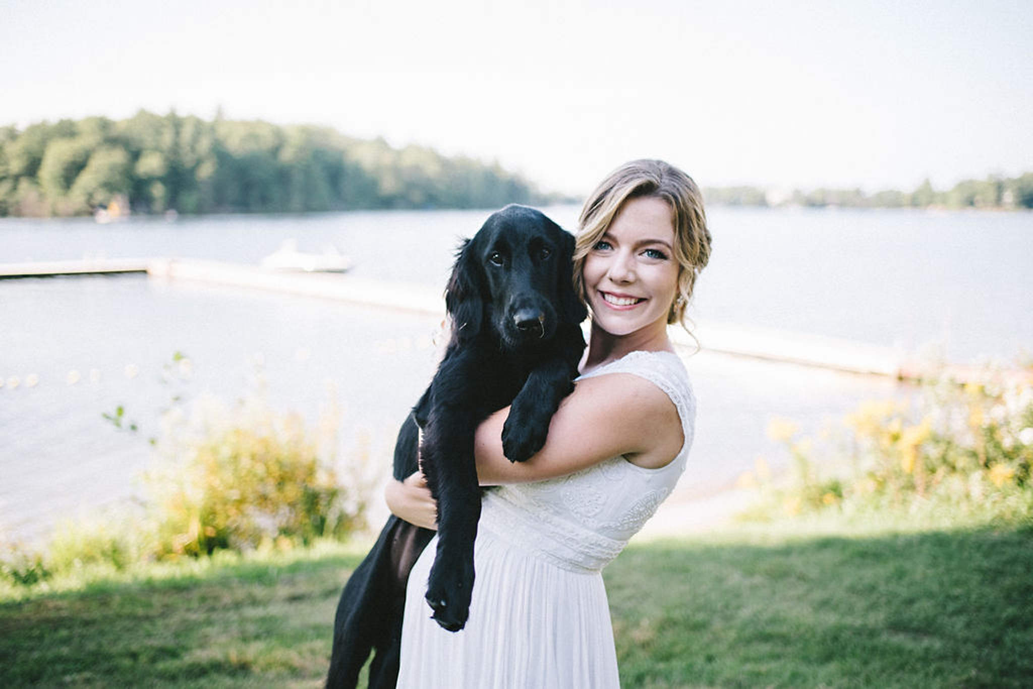 Boho bride with her cute puppy at Parry Sound camp wedding