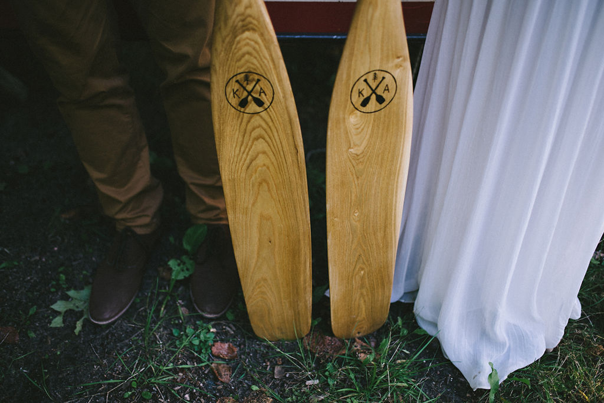 Custom canoe paddles at Parry Sound camp wedding