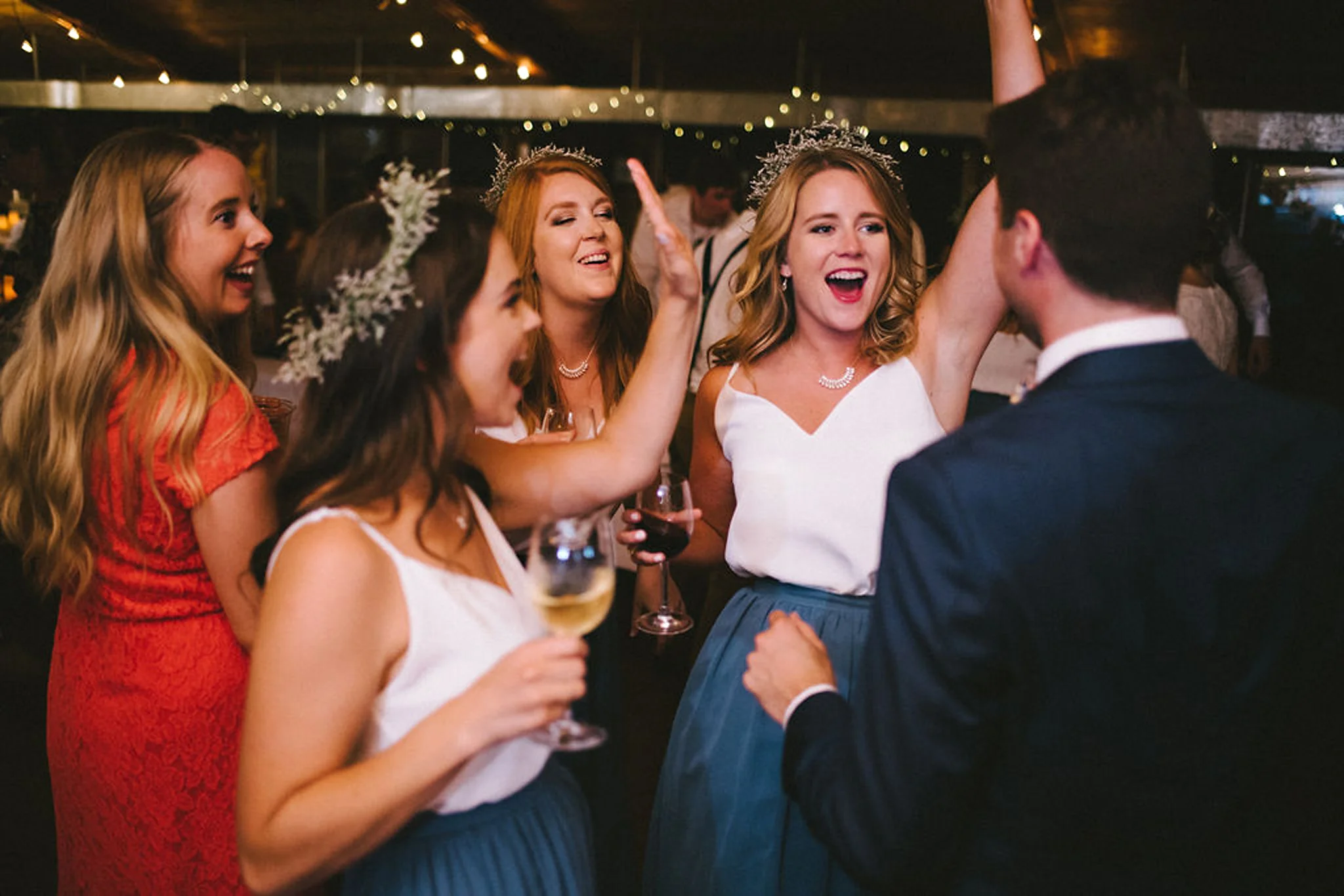 Bridesmaids dancing at Parry Sound camp wedding