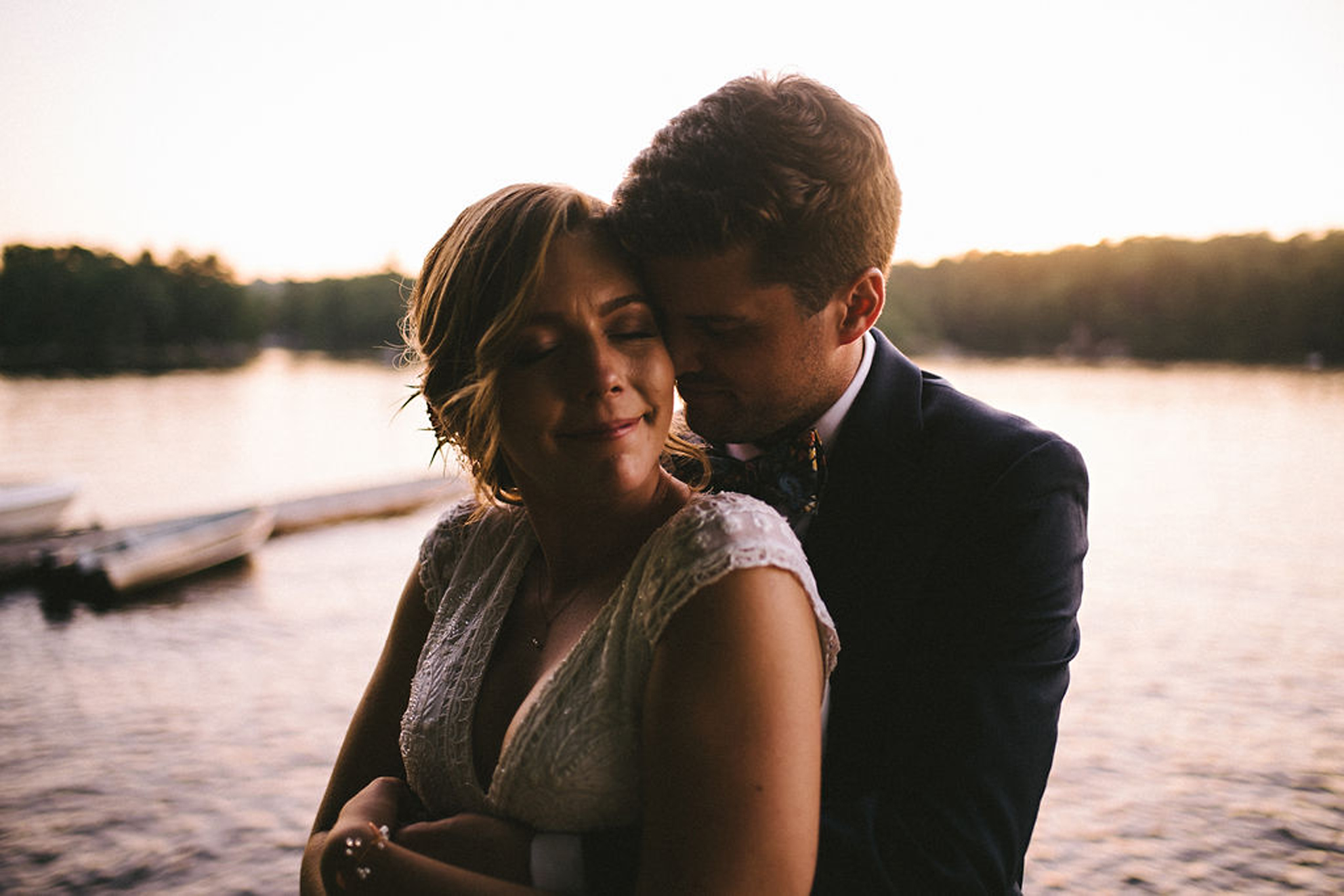 Golden hour portraits of couple at Parry Sound camp wedding