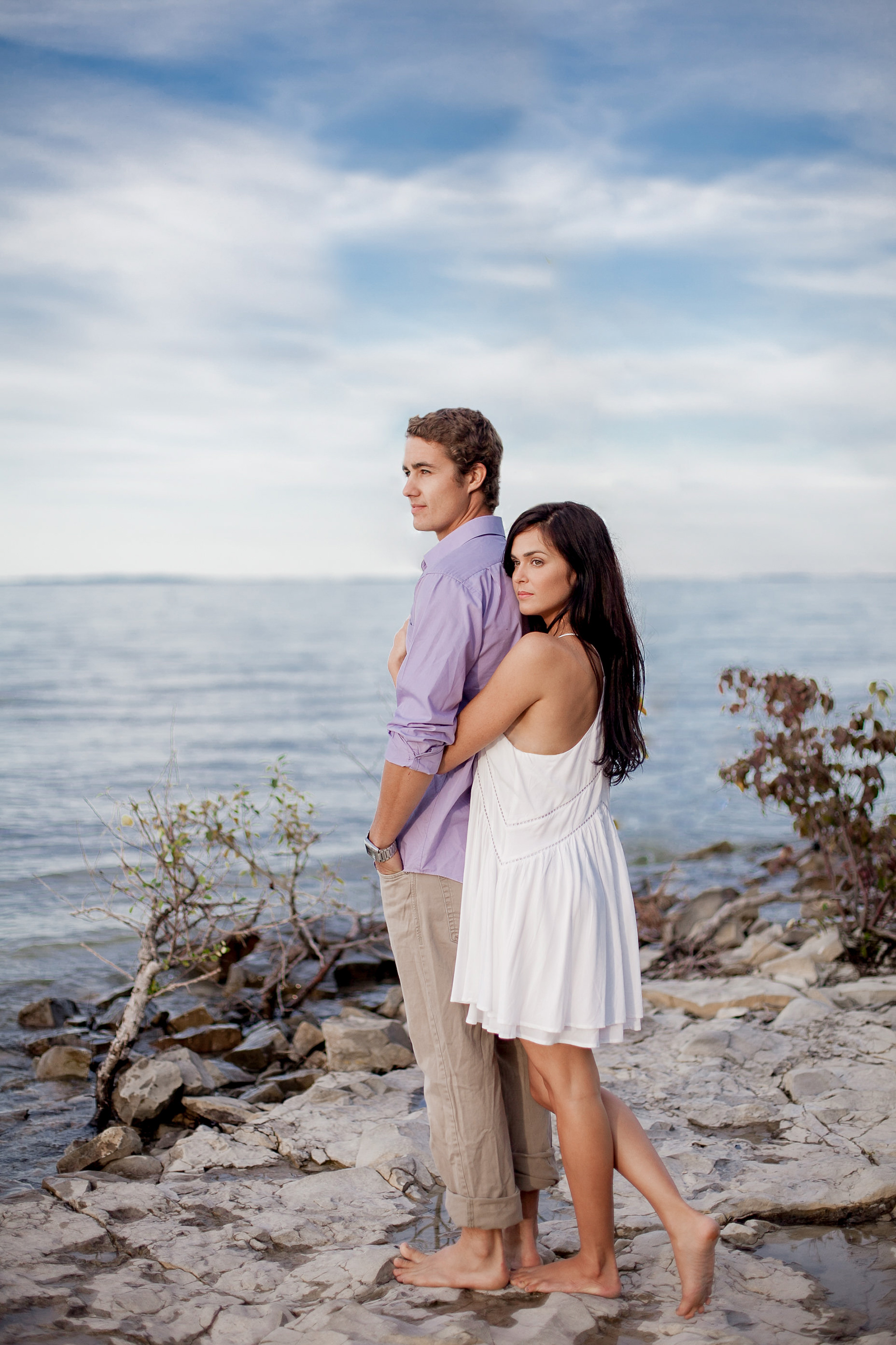 newly engaged couple on the shores of georgian bay during Craigl