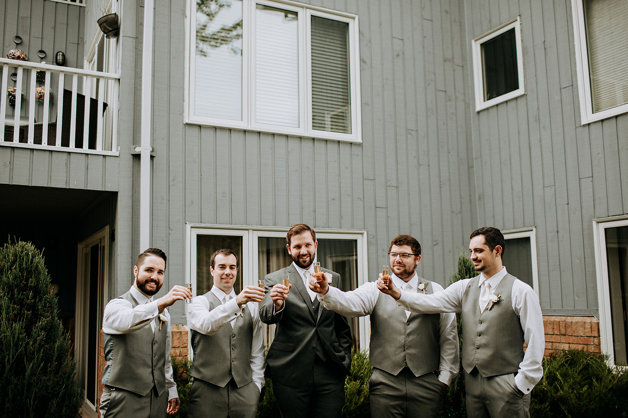 groomsmen toasting at meaford barn wedding