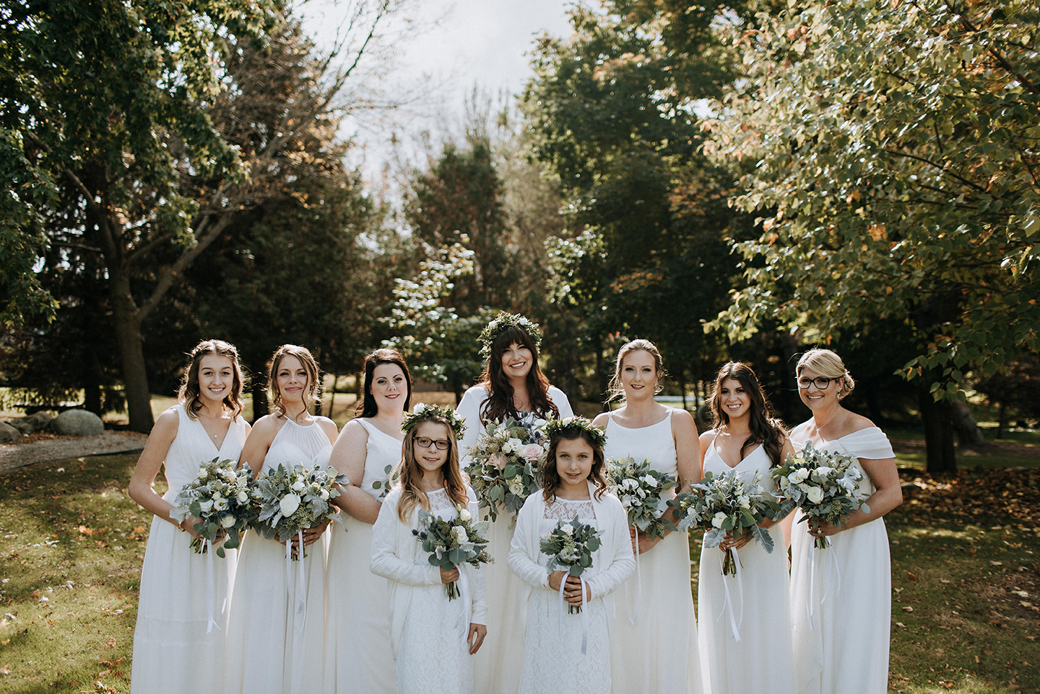 bridesmaids wearing different dresses at meaford barn wedding