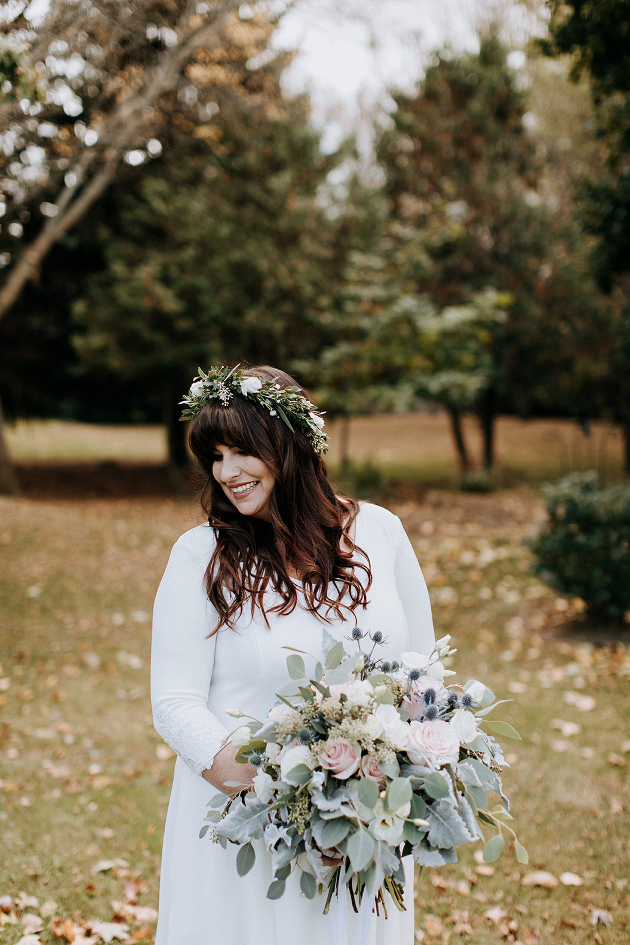 beautiful boho bride with flower crown and blush bouquet at meaf
