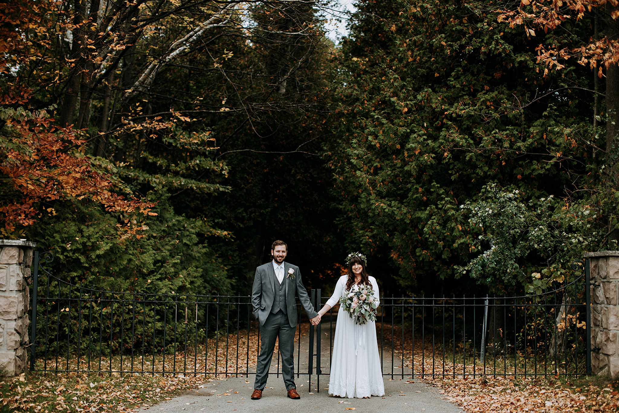 couples portrait with autumn leaves at meaford barn wedding