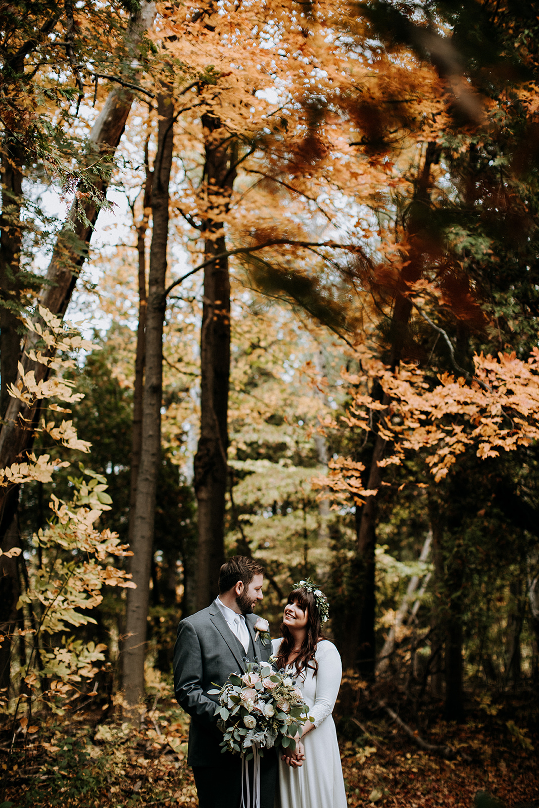 autumn leaves and a beautiful boho couple at meaford barn weddin