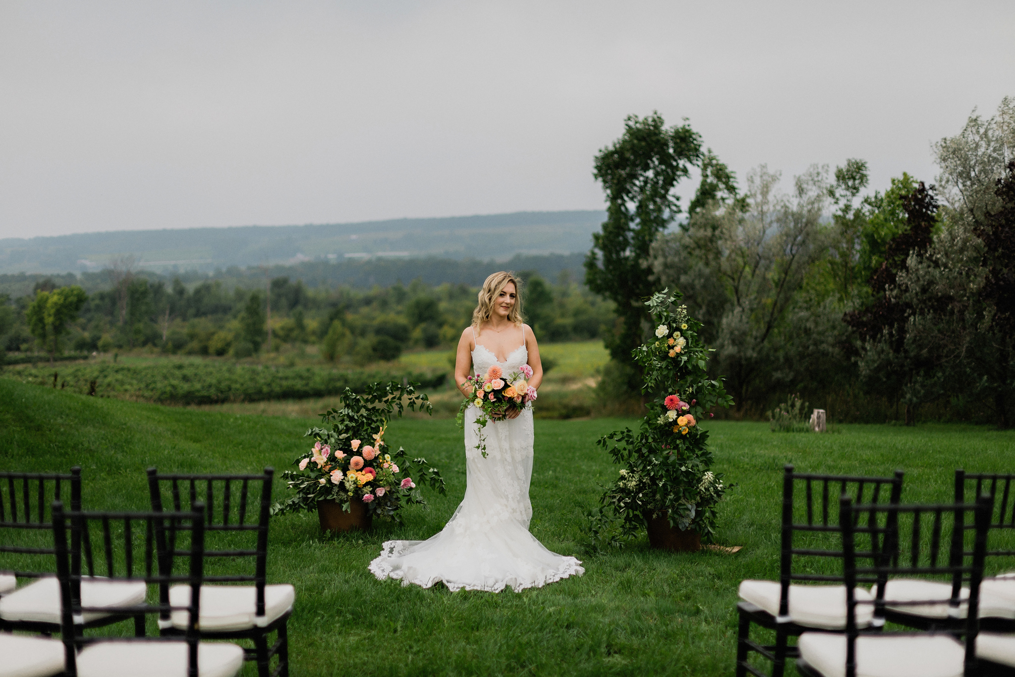 Bride with lace gown and natural wavy hair at Coffin Ridge Bouti