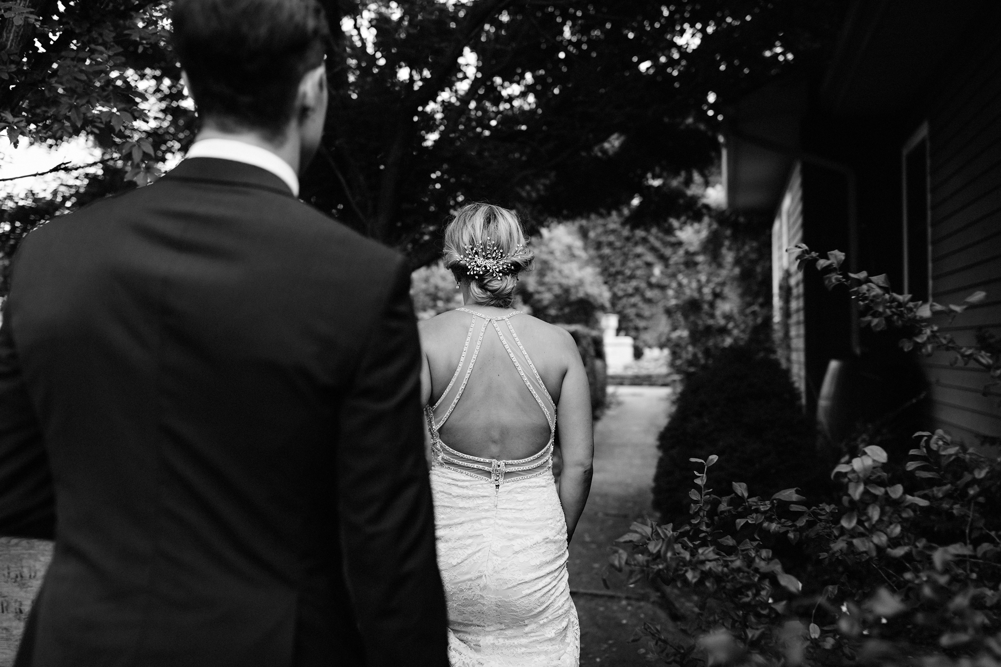 Bride and groom head to the gardens at Coffin Ridge Boutique Win