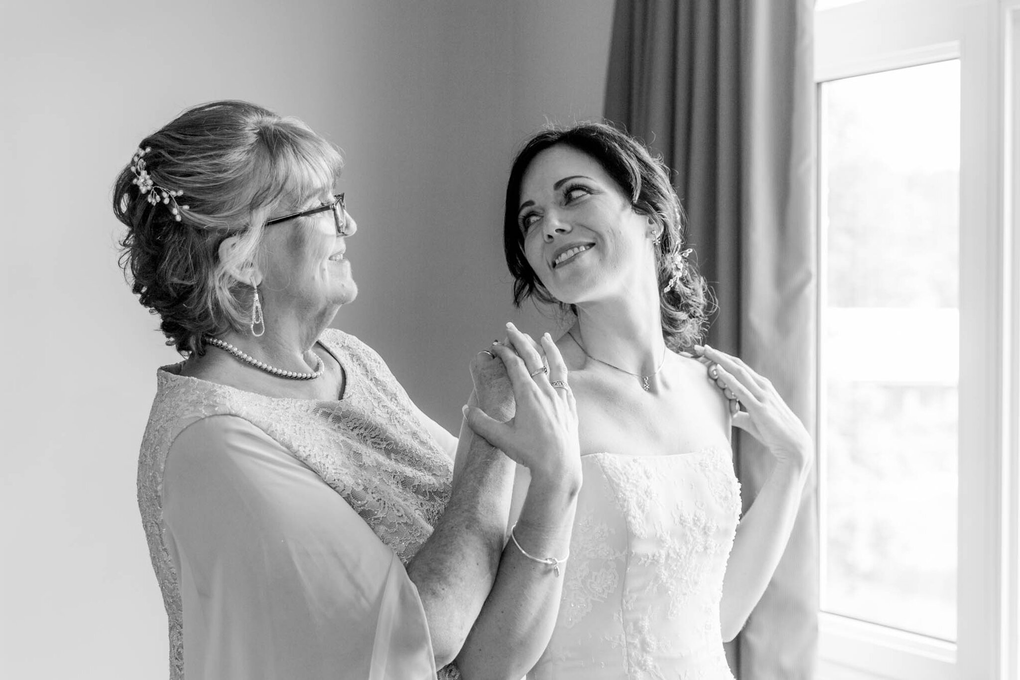 Bride and mother of bride first look at Walters Falls Inn and Sp