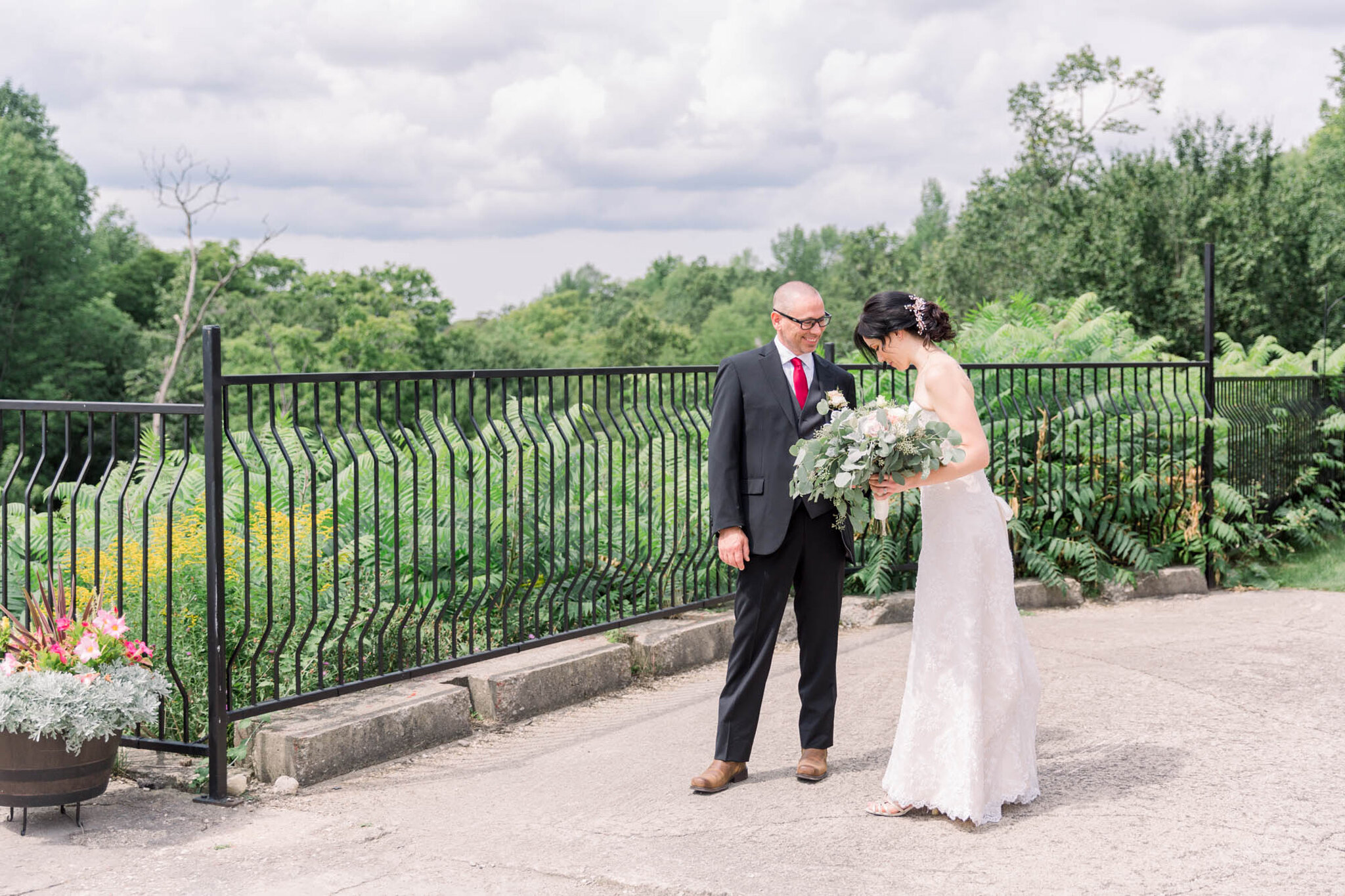 First Look with bride and groom outside at Walters Falls Inn and
