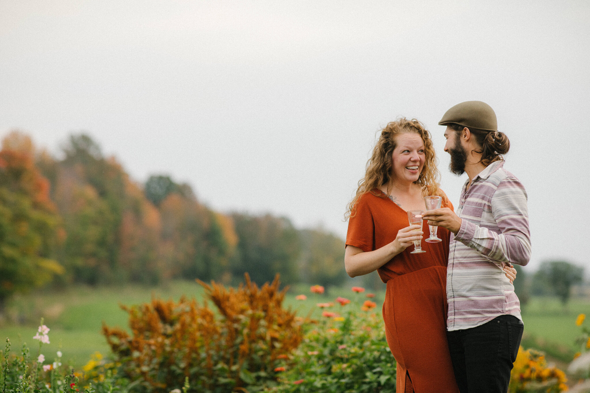 Celebrating right after surprise proposal at Harvest Moon Farm