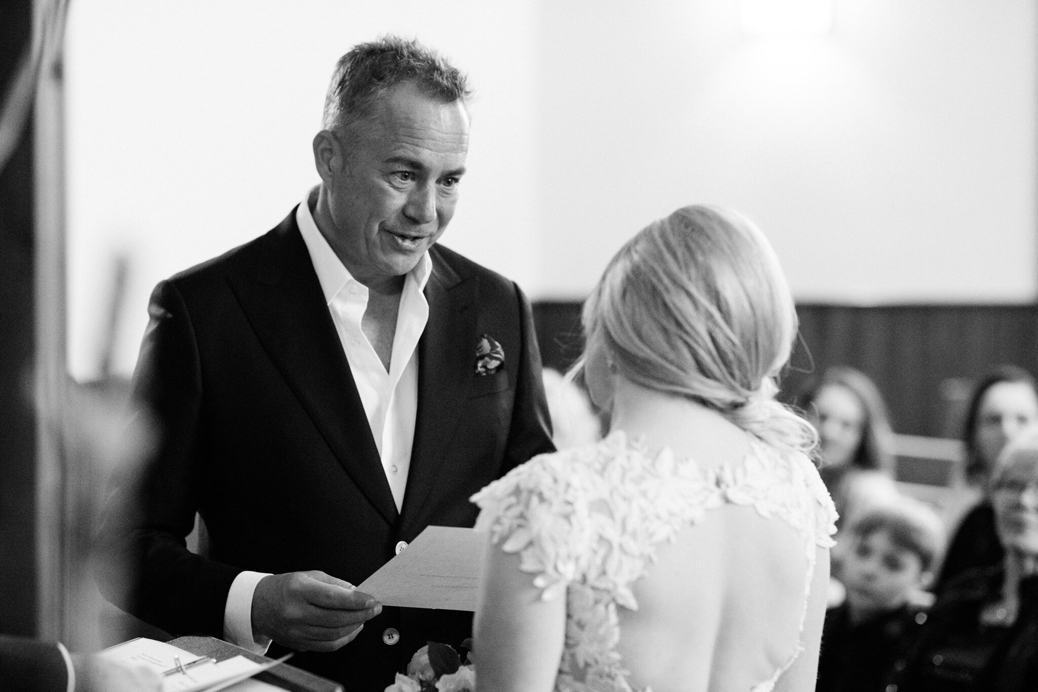 Groom reads his personal vows at intimate winter thornbury weddi