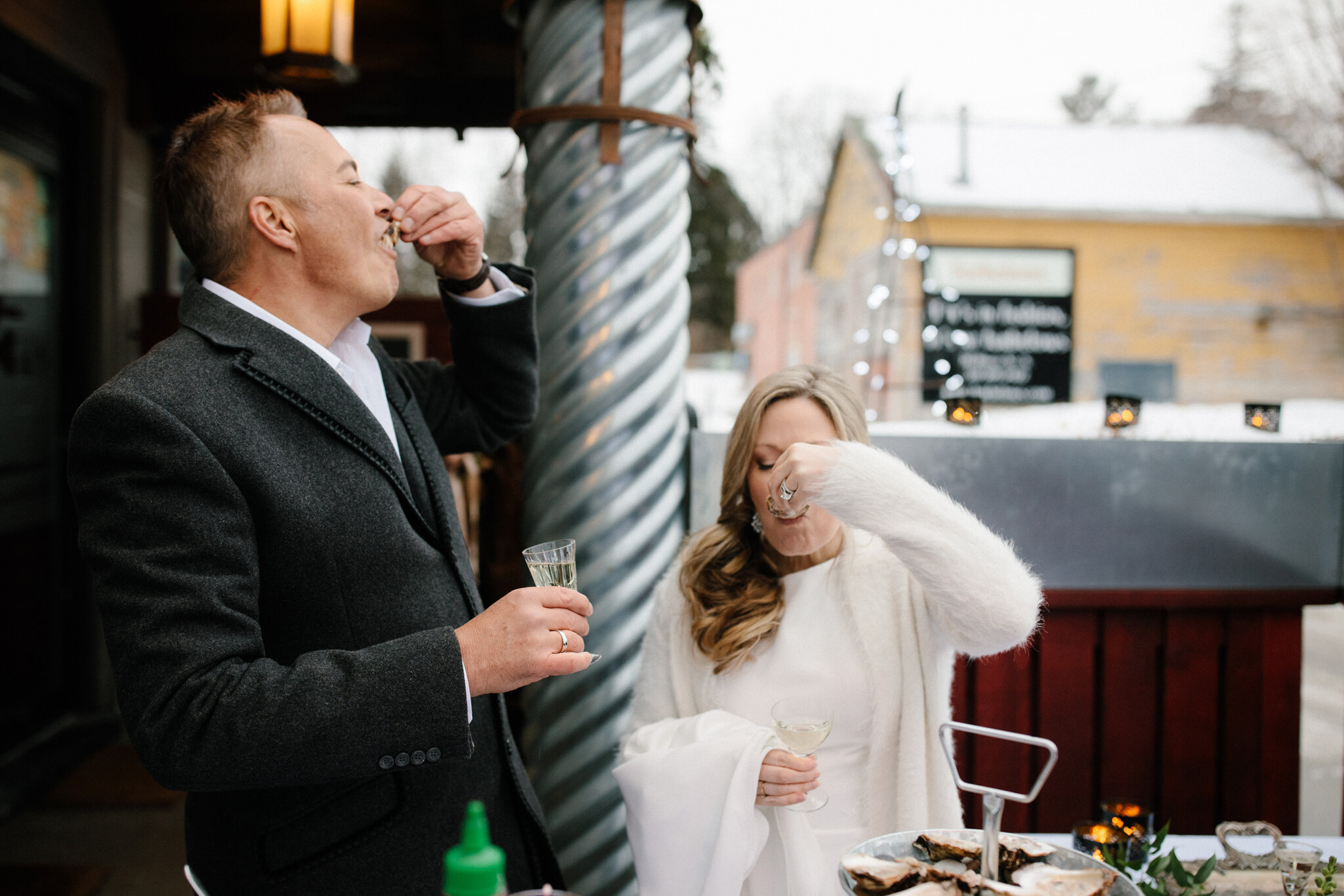 Couple enjoy oysters at Bruce Wine Bar for intimate wedding in T