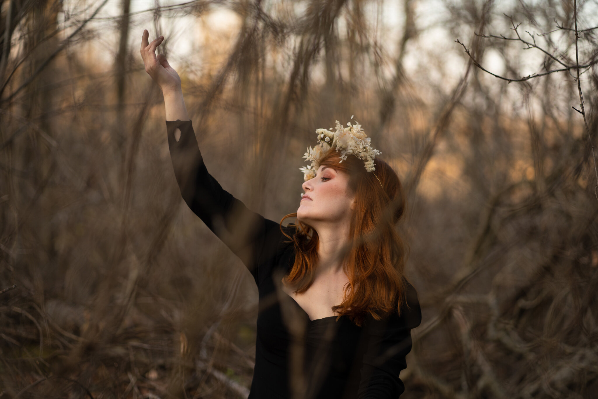 Fall forest creative portrait session with red headed model and 