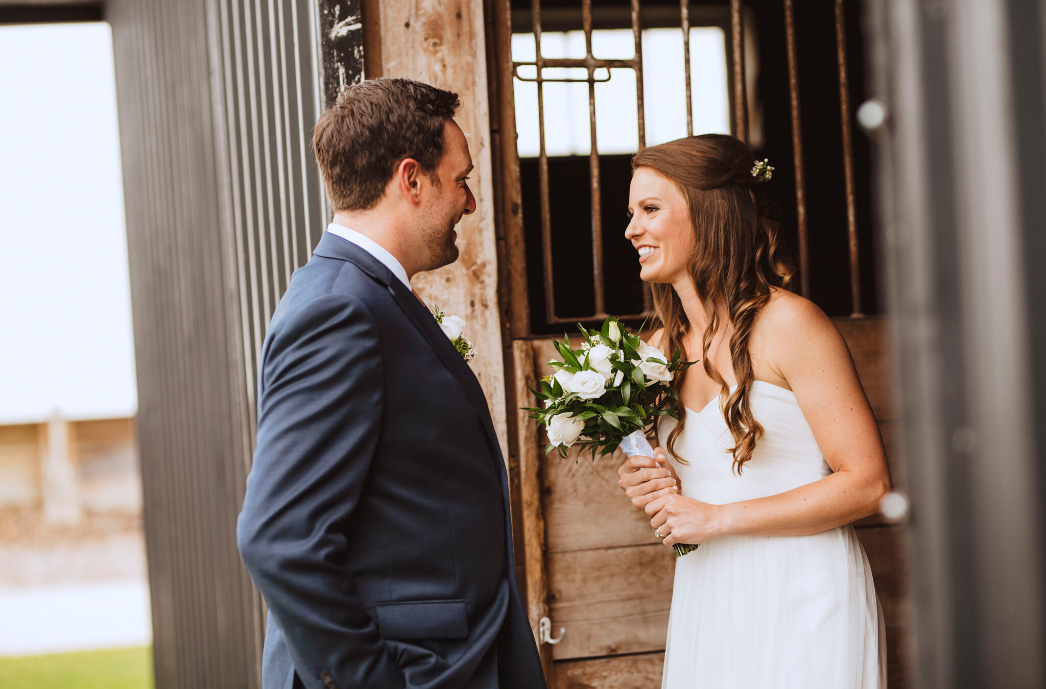 Bride and Groom portraits in horse barn in south georgian bay