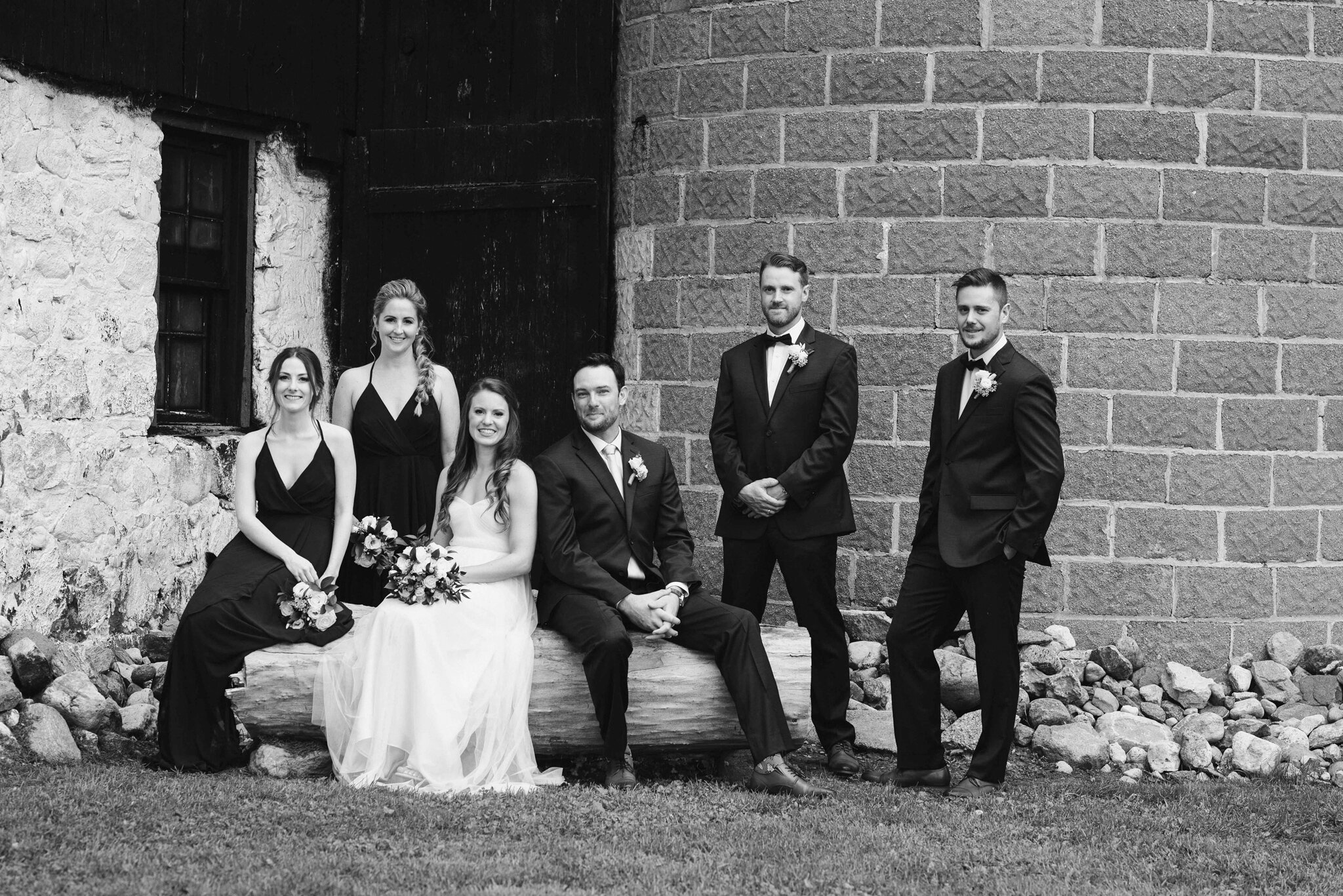 Wedding Party portrait in front of Barn at intimate backyard geo