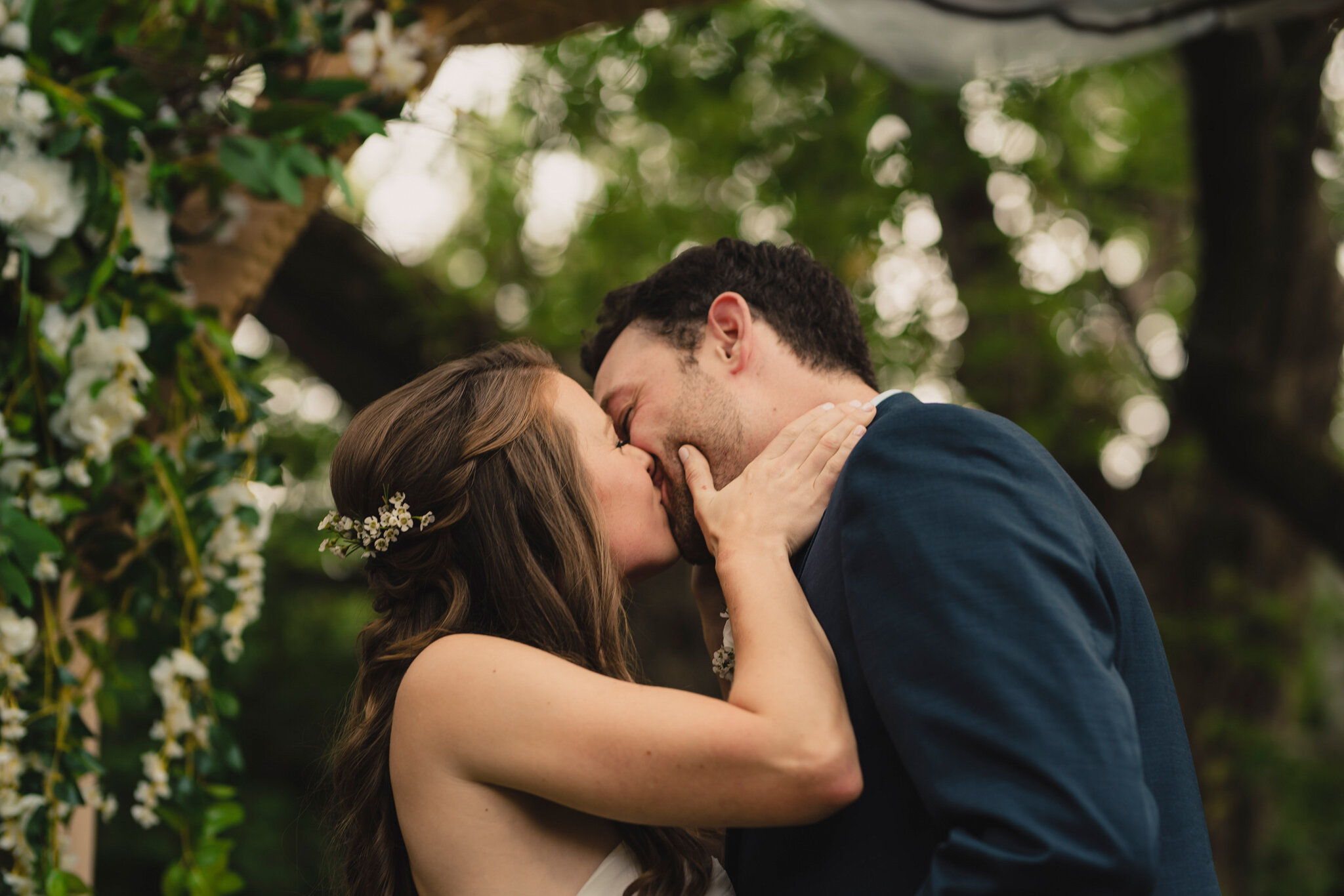 first kiss at intimate backyard south georgian bay wedding