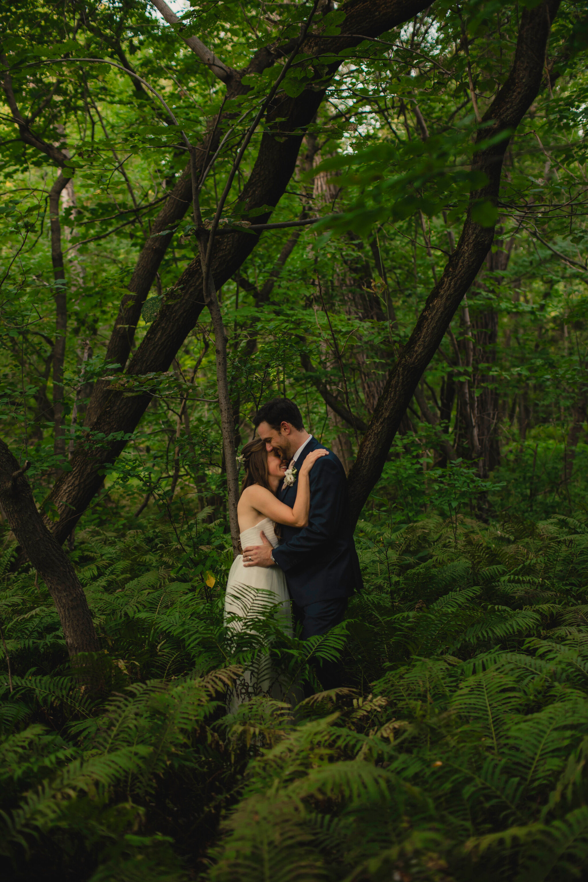 wedding portrait in the forest with ferns in south georgian bay