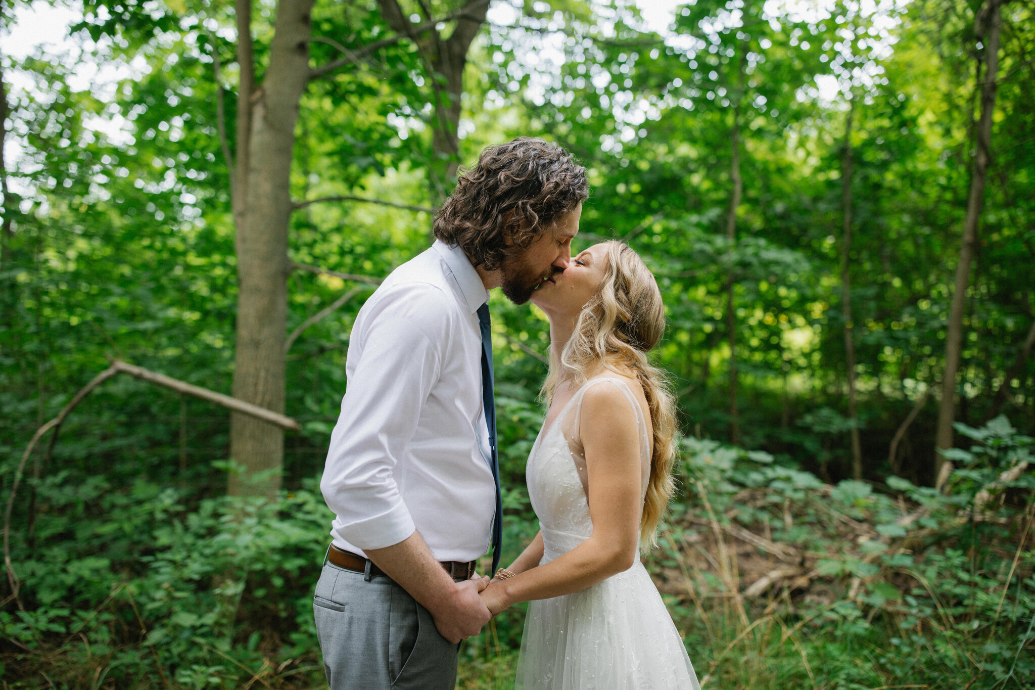 Summer wedding first look in forest in Meaford