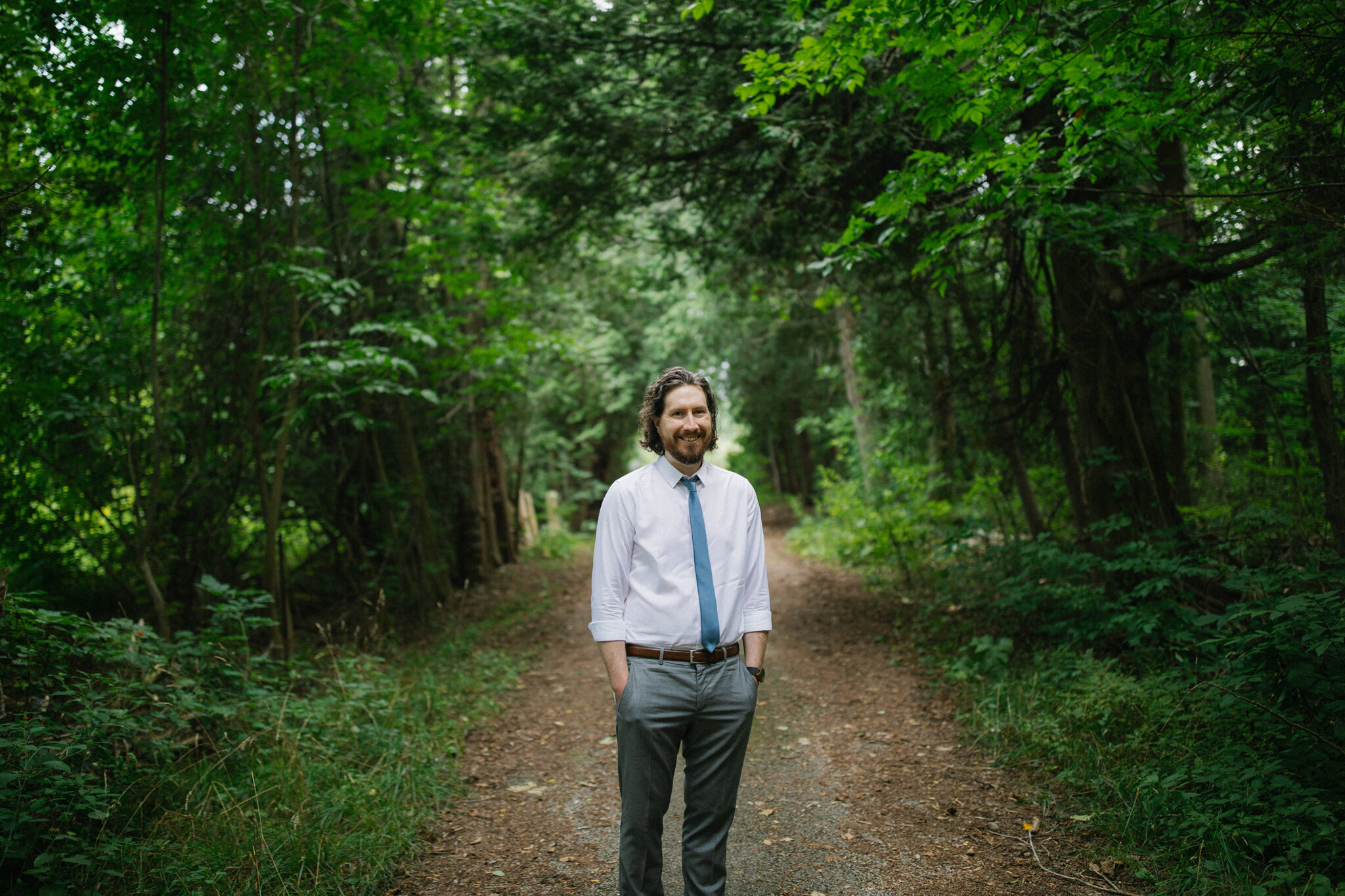 Groom waiting in forest for first look Meaford