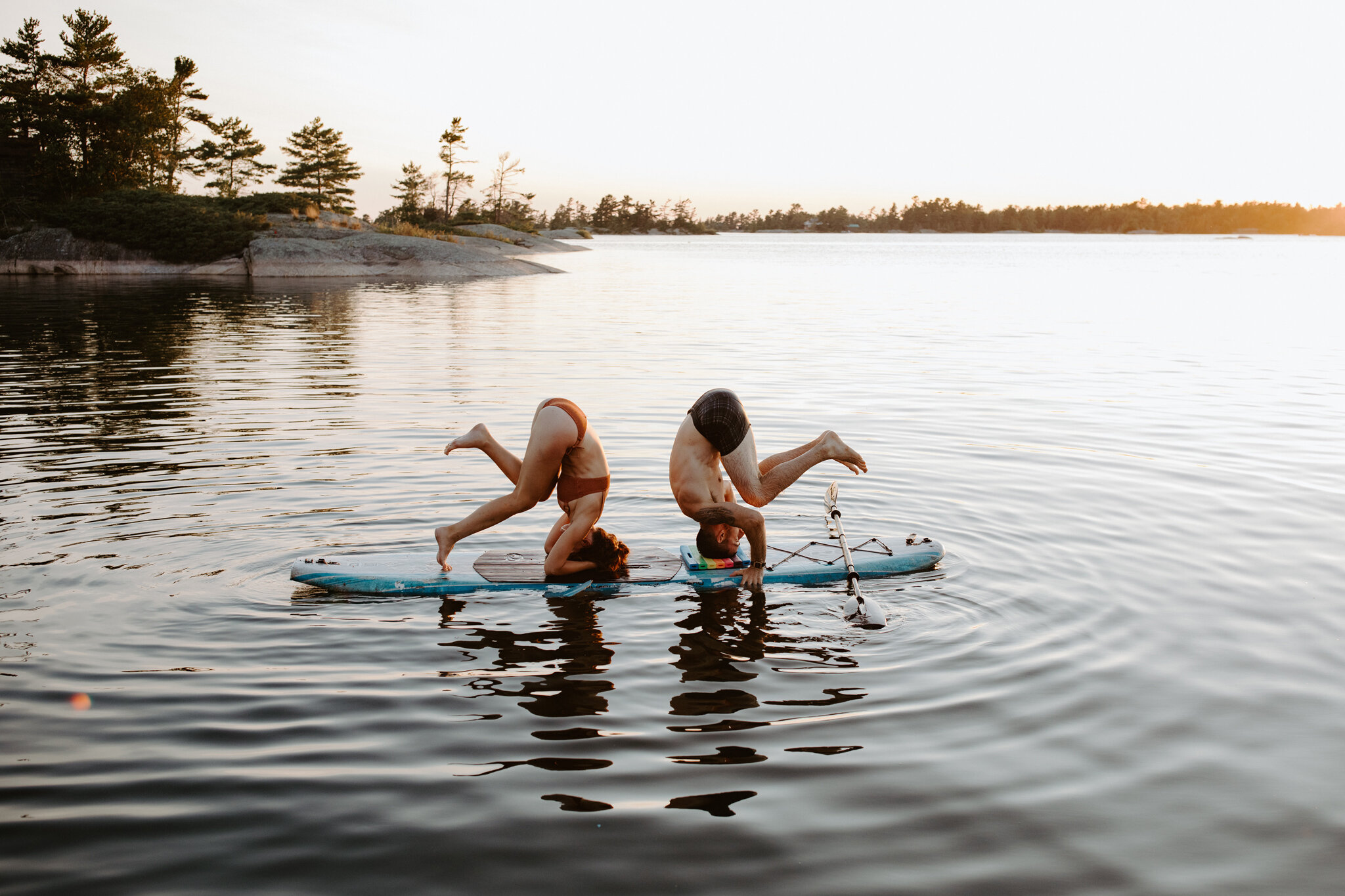 georgian bay paddle board couple's yoga