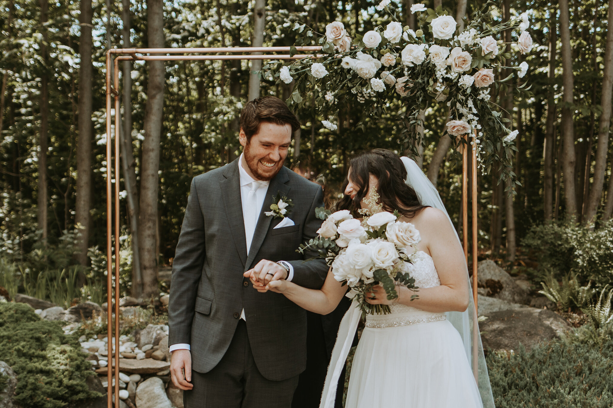 Just married backyard Lora Bay wedding Copper arch