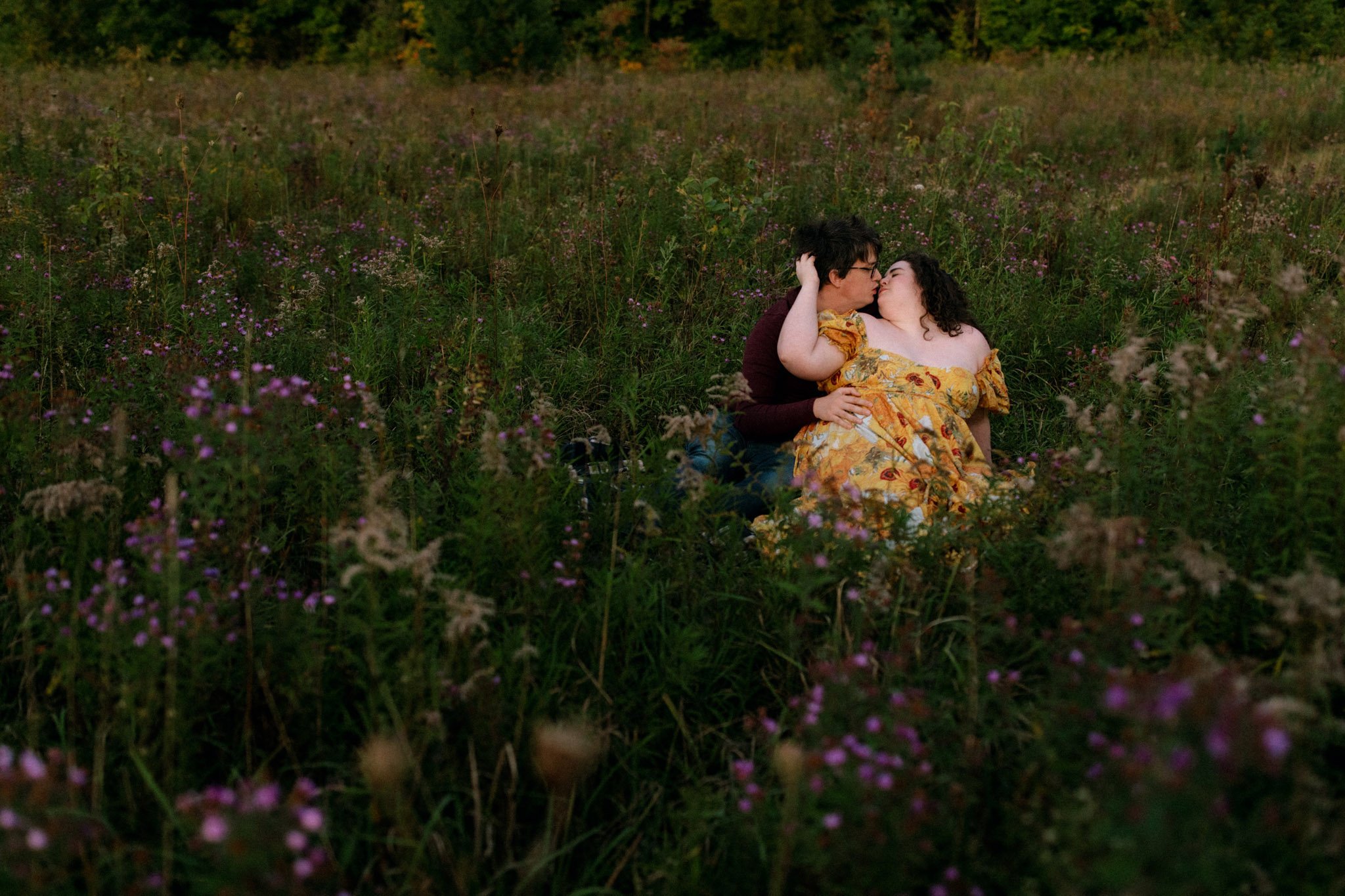 Cozy engagement session in wildflower field at Ladybank Farm