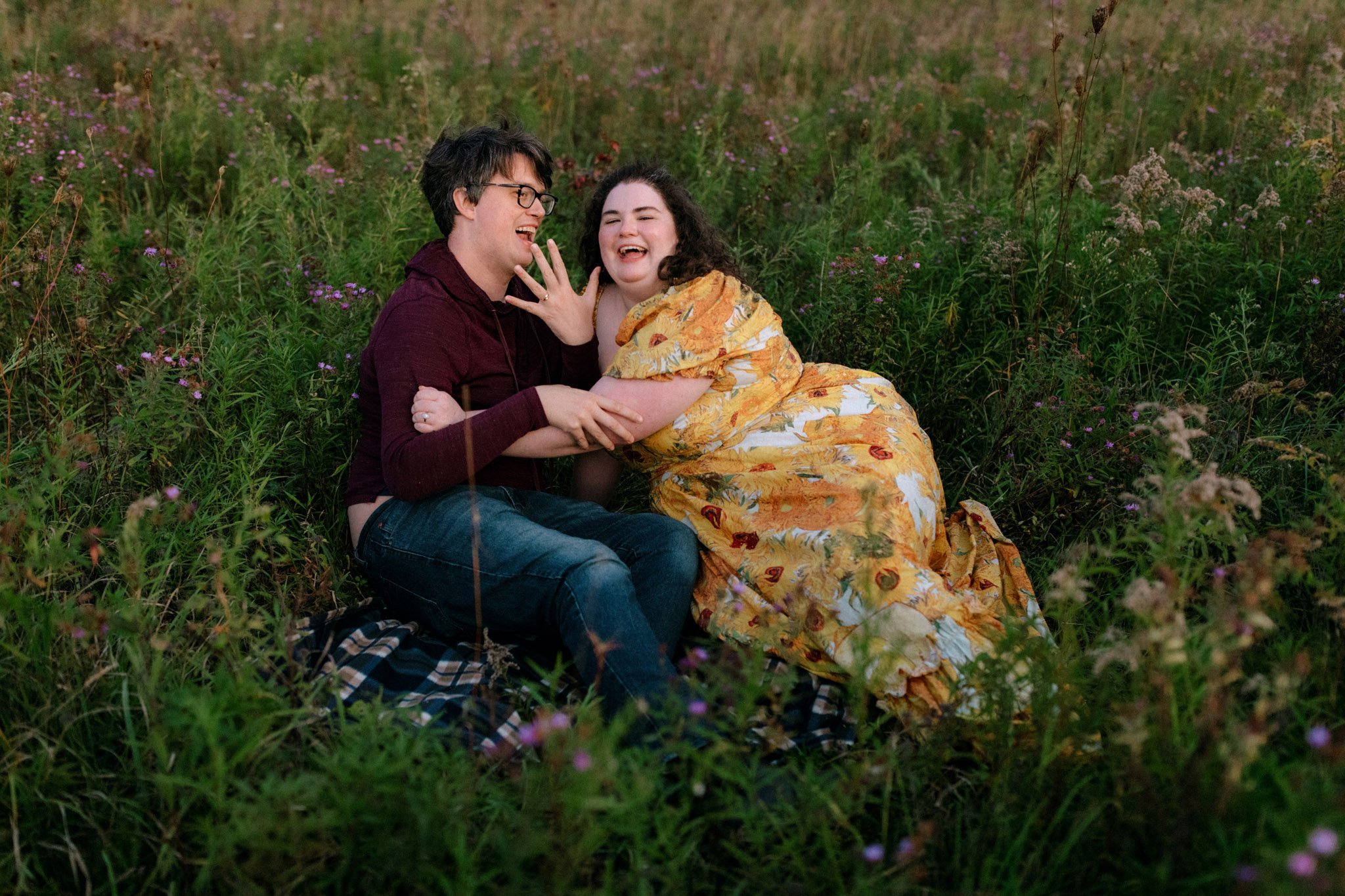 Cozy engagement session in wildflower field at Ladybank Farm