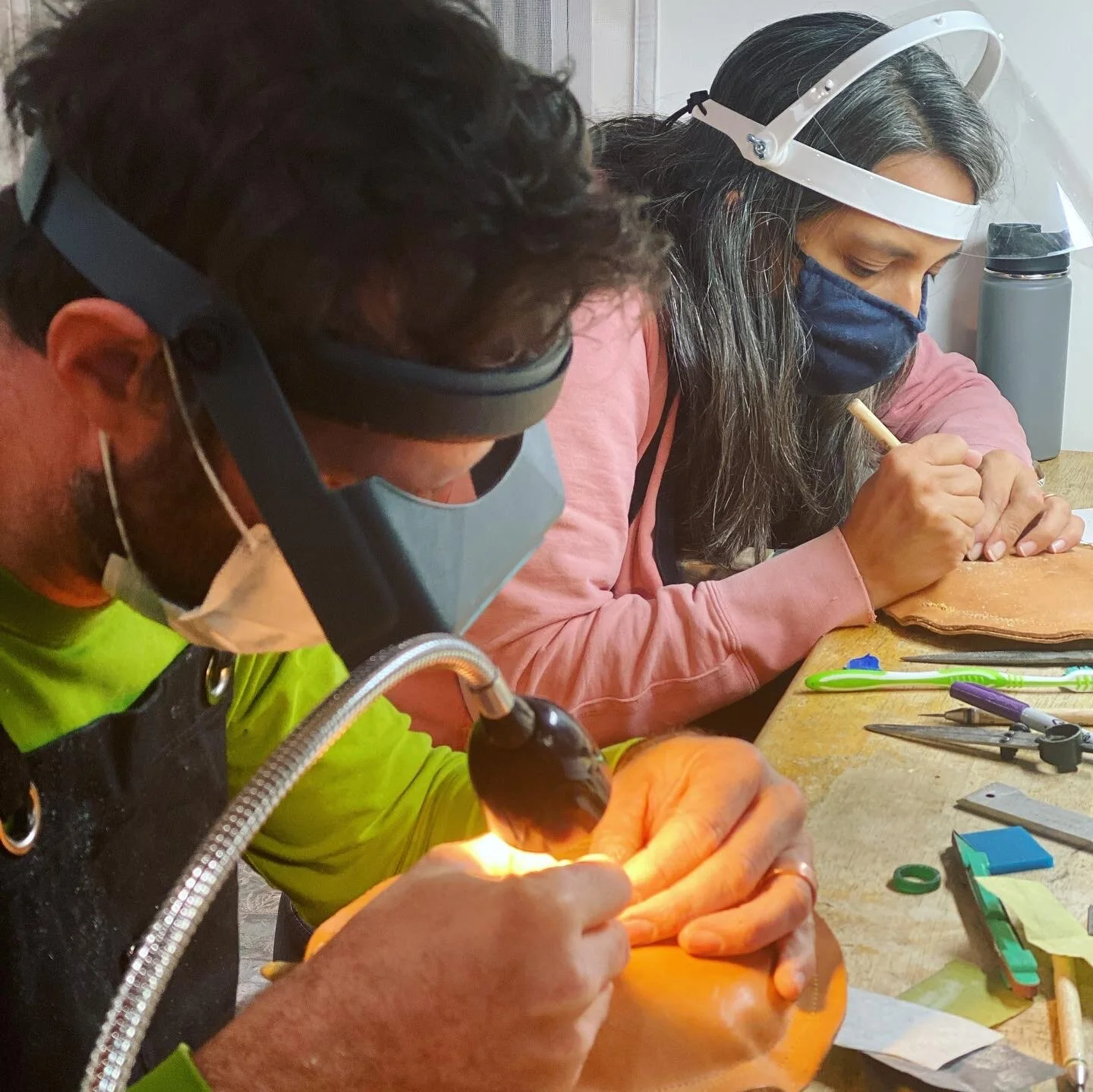 Clients making their own wedding rings at Ringed studio
