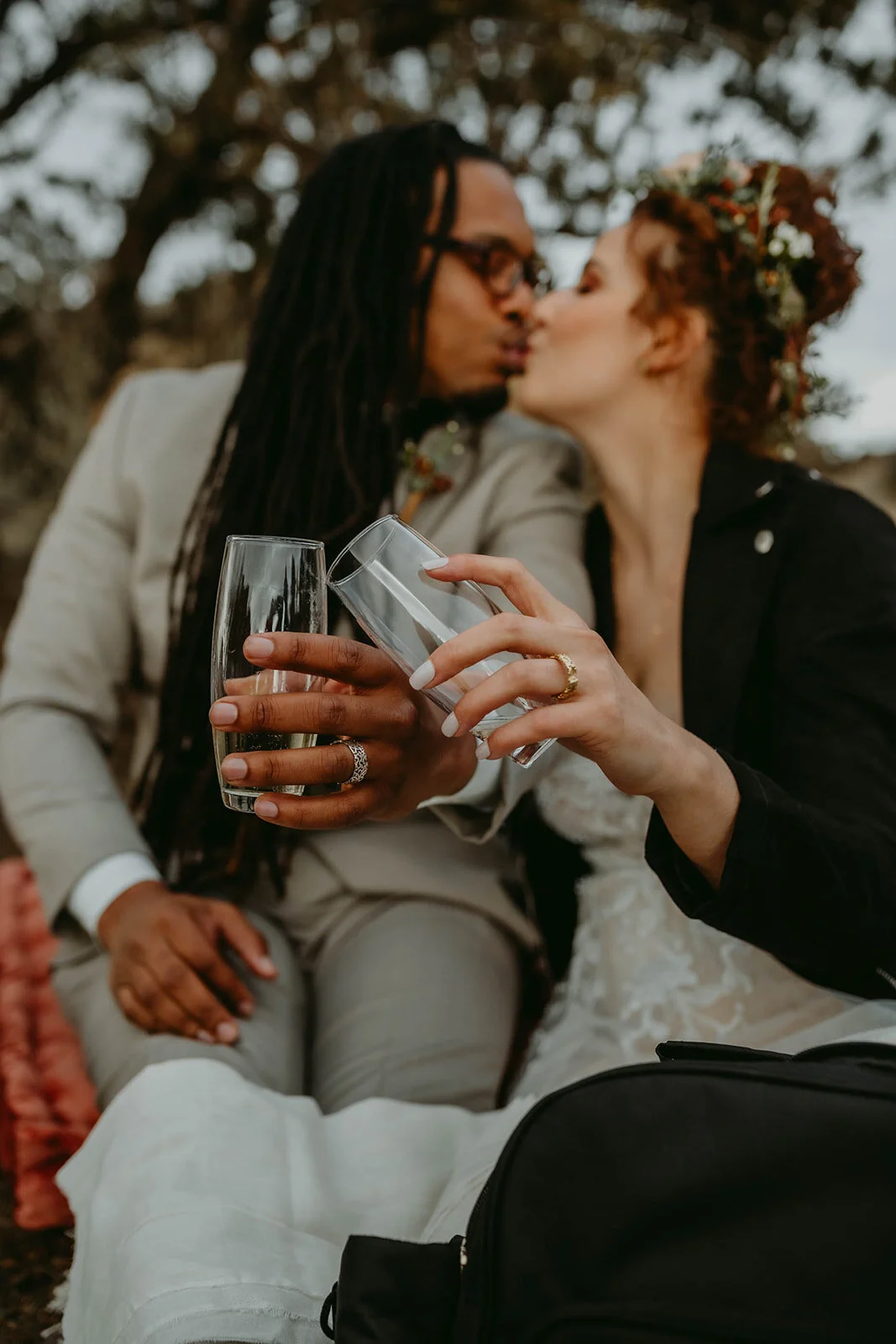 Couple cheers to handmade wedding rings