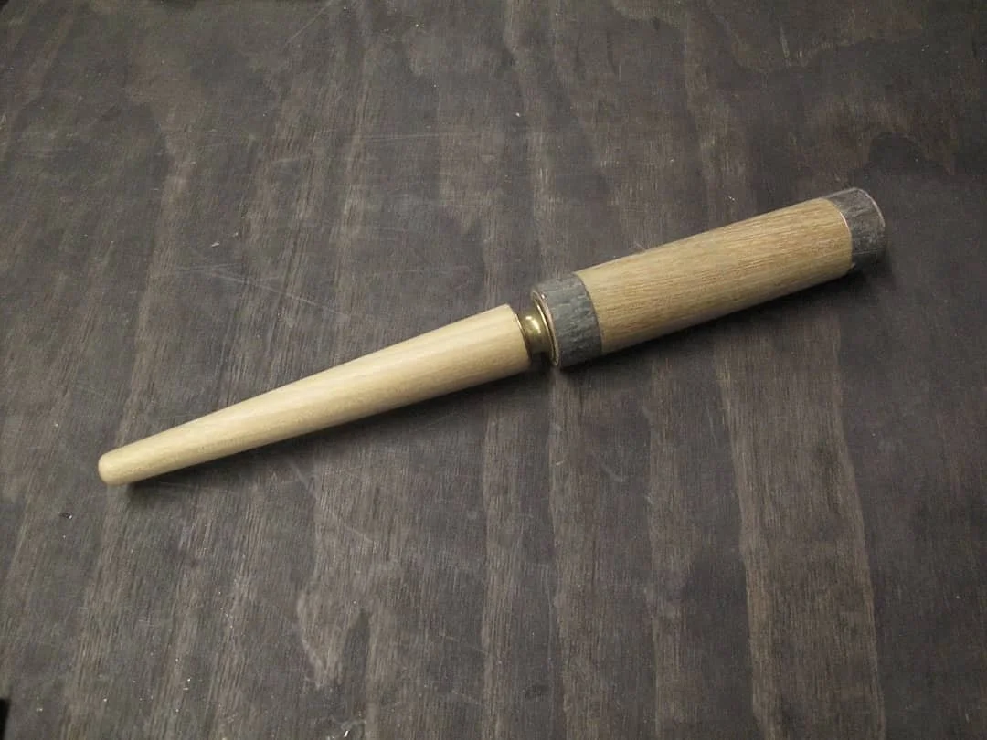 Made a black locust + bronze split fid for setting round thimbles #sailmaking #canvaswork