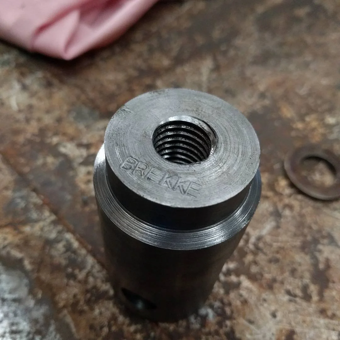 Couple of struts to support a cast concrete sink. Pinned connections w/ quick and dirty load adjustment at one end