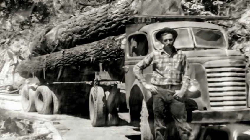 JAY HOLT WITH HIS FIRST LOG TRUCK