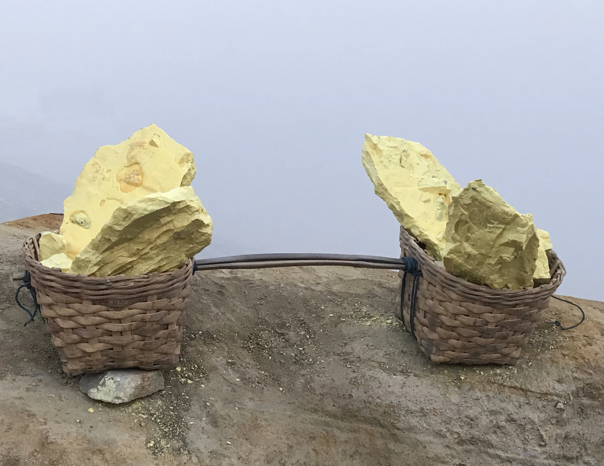 A miner's baskets, full of sulfur. 