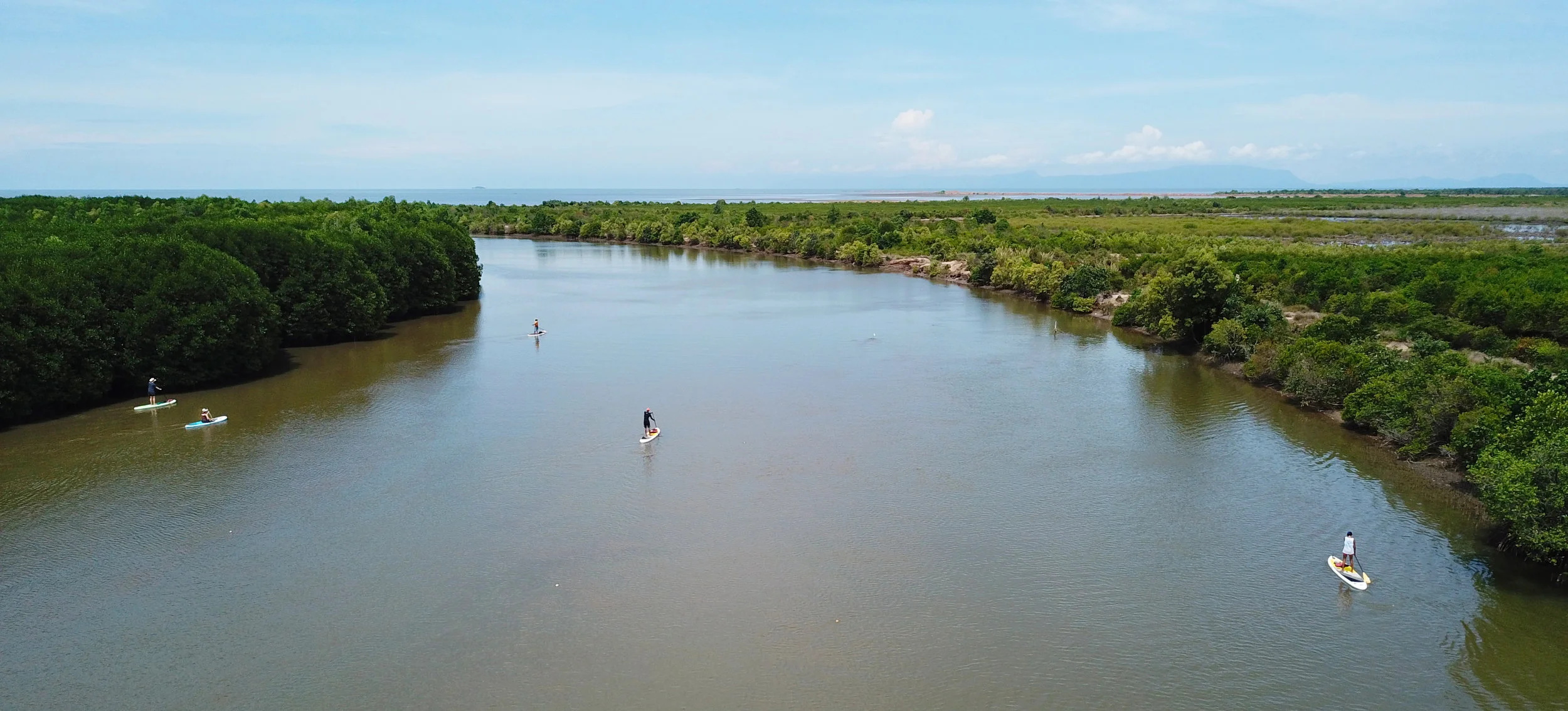 A drone shot of us paddling down the river, we're the two over on the left. 