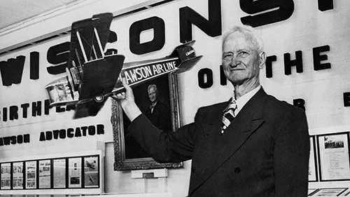 Alfred Lawson with model of his first airliner, photo taken at the Wisconsin Cenntenial in 1948. 