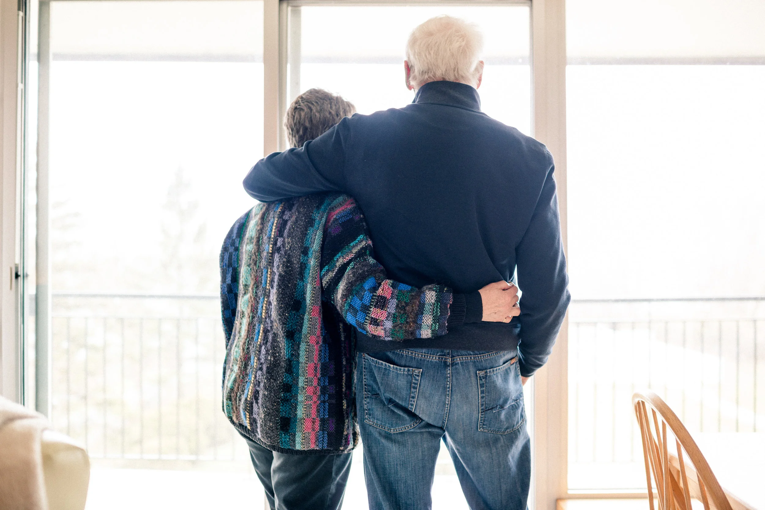 After 53 years together, they are still in love. Here they are, looking out toward the lake through the window of their condo, looking toward the bright future.