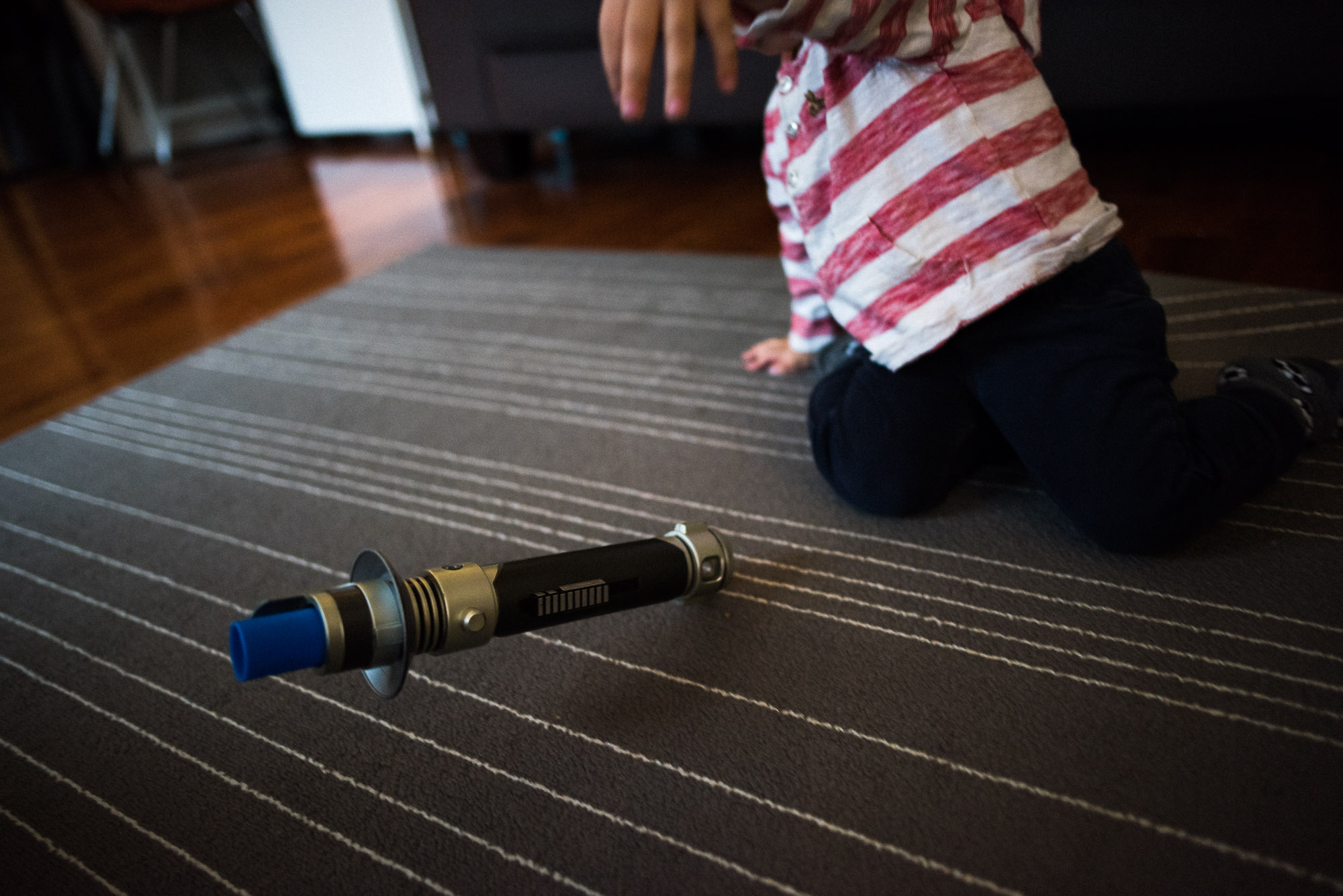 boy drops lightsaber