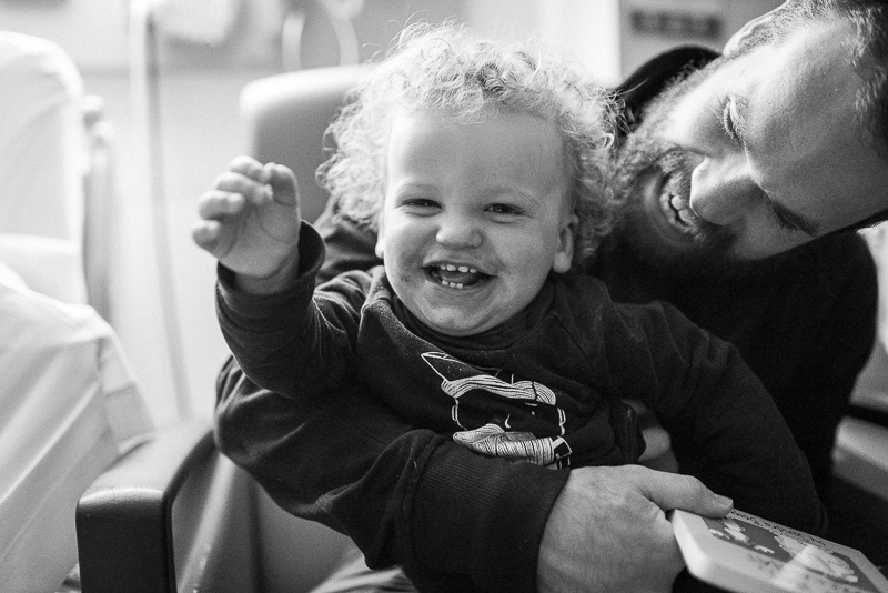 father and son enjoy some laughs