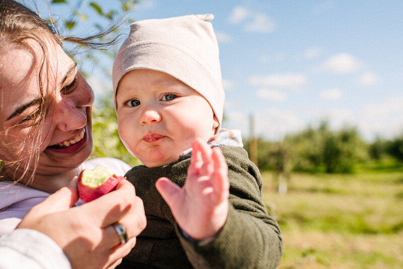 candid family photography session  at wynn farms near kingston ontario