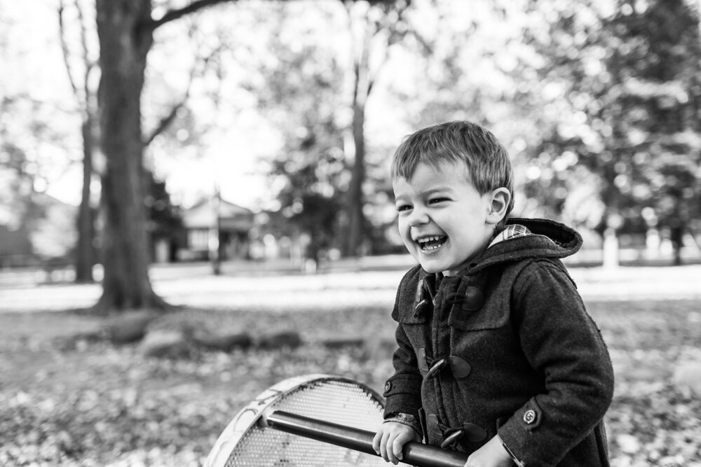 Candid family photography session in skeleton park in kingston o
