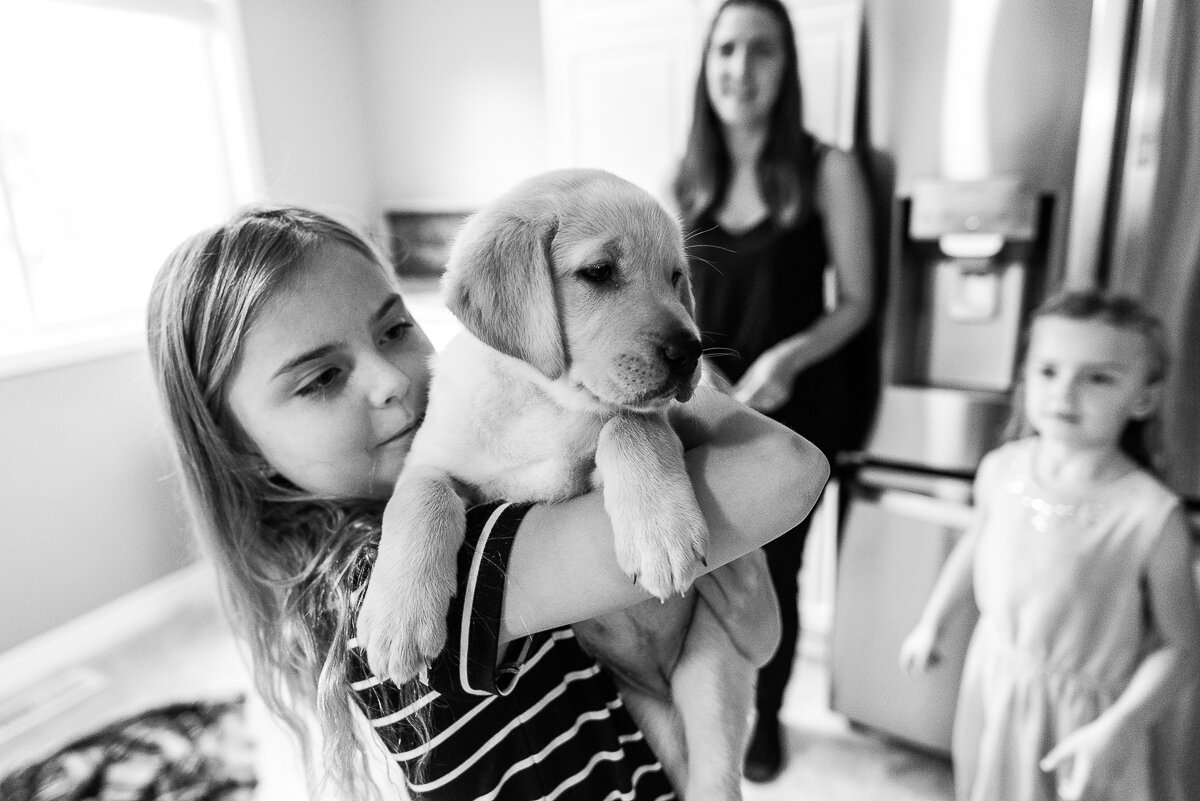 A day in the life, Kingston Ontario Family snuggles with new puppy 