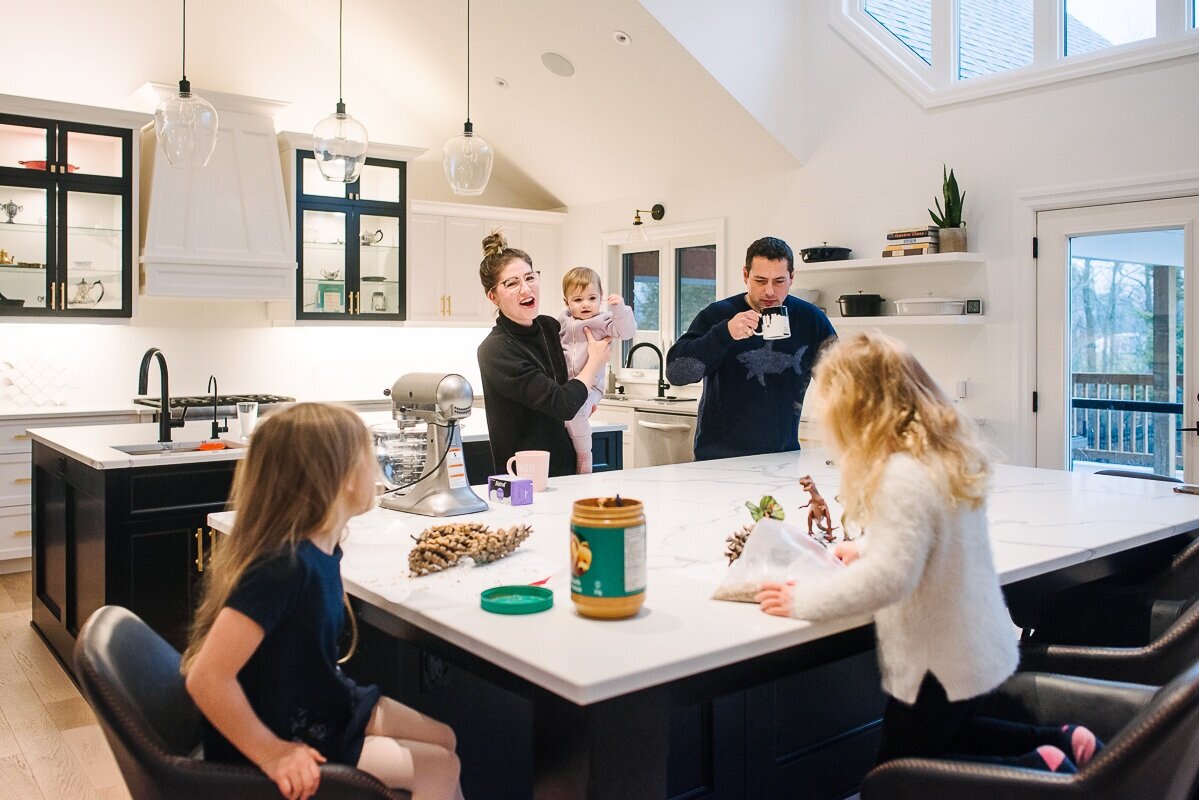 Family having breakfast in kitchen during day in the life session with Viara Mileva 