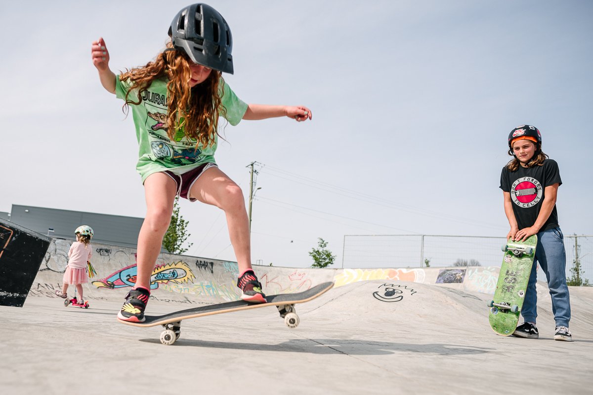 Little girl skateboarding with confidence