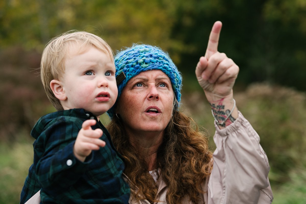 Mom and son looking up in the sky