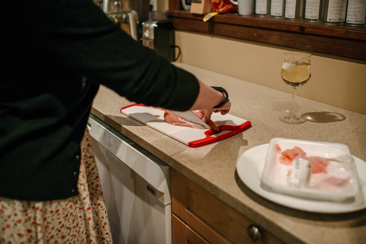 Mom preparing food for her family in the kitchen