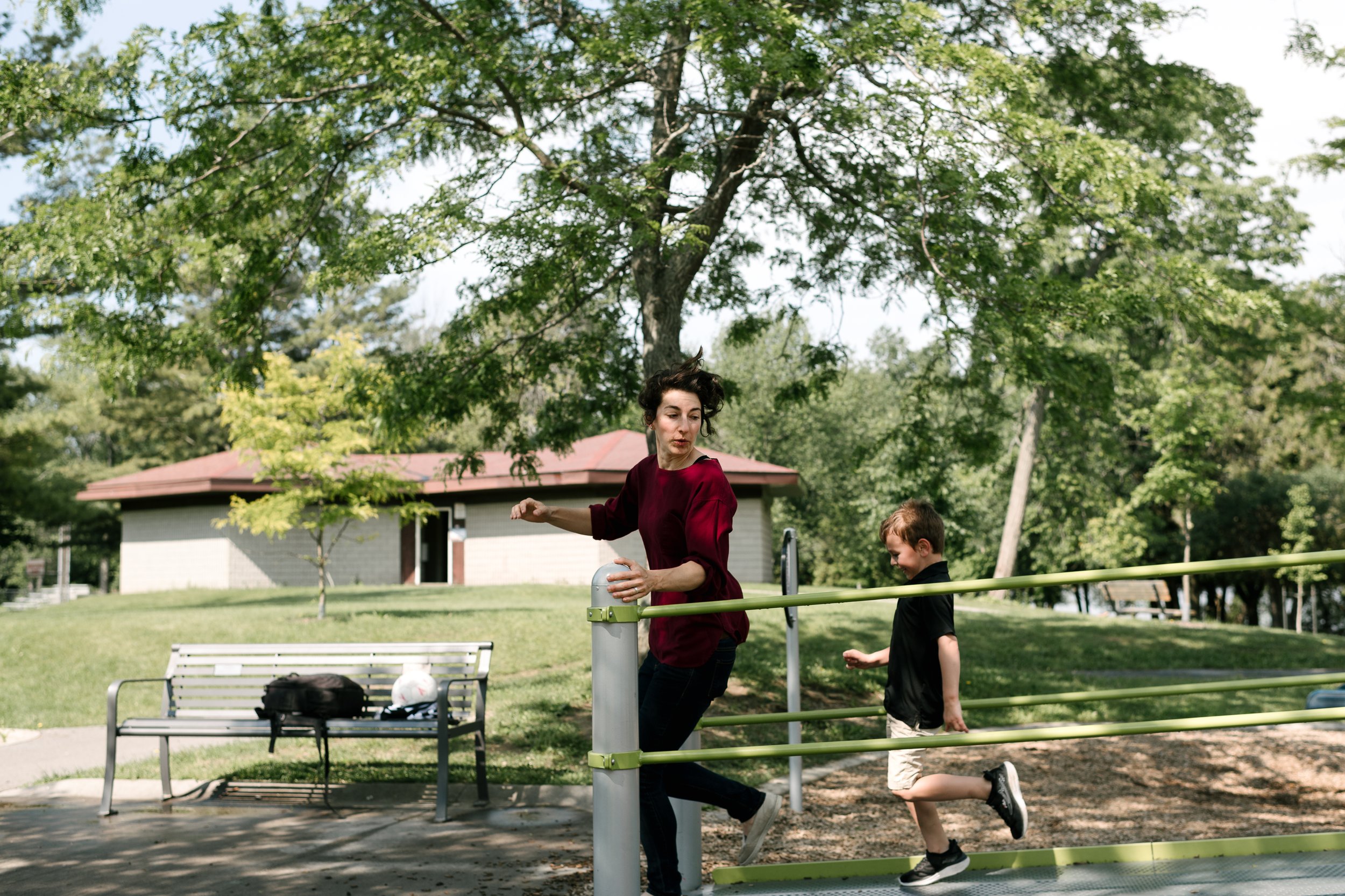 Boy playing with his aunt in the playground